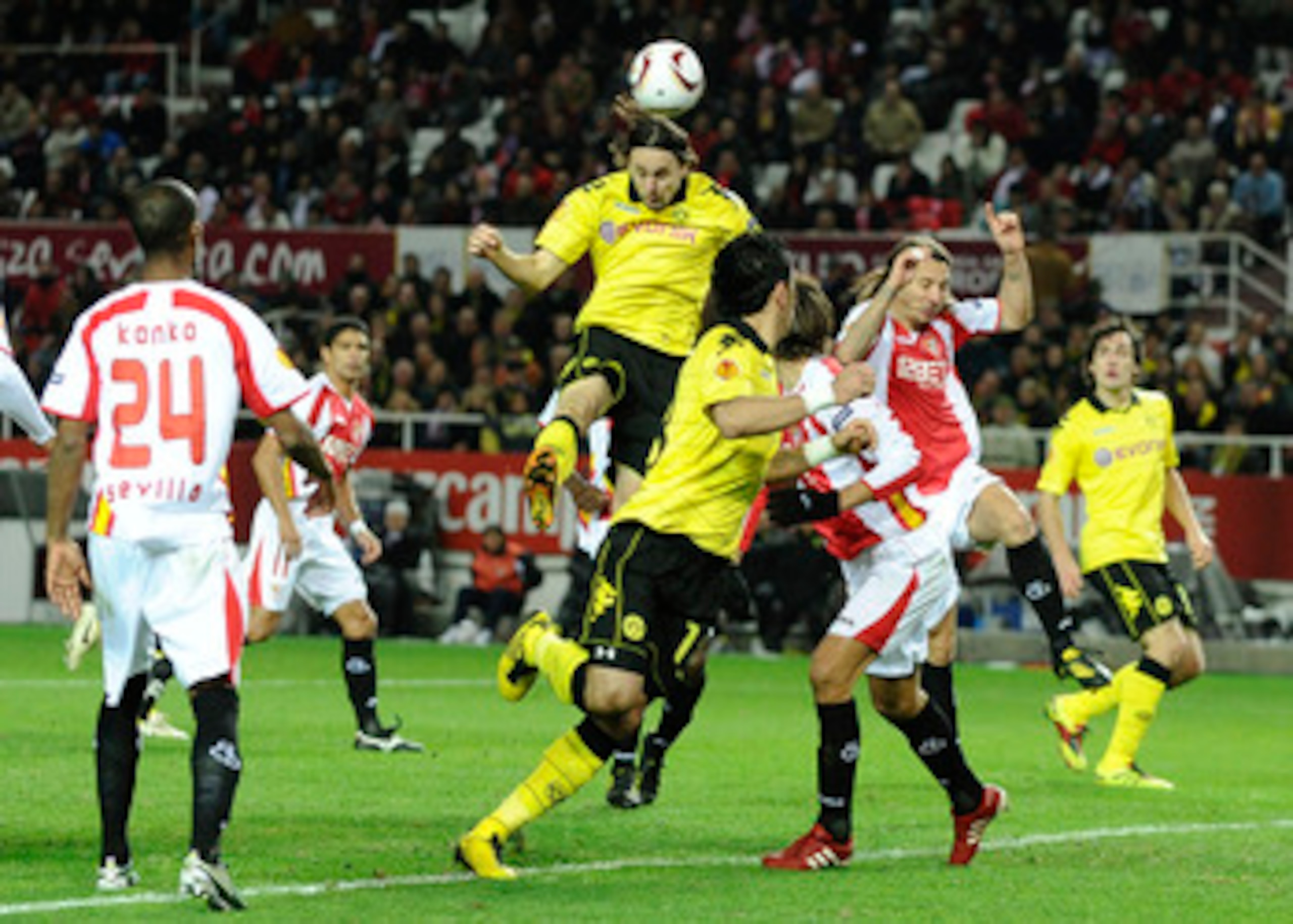 SEVILLE, SPAIN - DECEMBER 15: Neven Subotic of Borussia Dortmund (C) scores his team's second goal during the UEFA Europa League group J match between Sevilla and Borussia Dortmund at Estadio Ramon Sanchez Pizjuan on December 15, 2010 in Seville, Spain. SEVILLE, SPAIN - DECEMBER 15: Neven Subotic of Borussia Dortmund (C) scores his team's second goal during the UEFA Europa League group J match between Sevilla and Borussia Dortmund at Estadio Ramon Sanchez Pizjuan on December 15, 2010 in Seville, Spain.