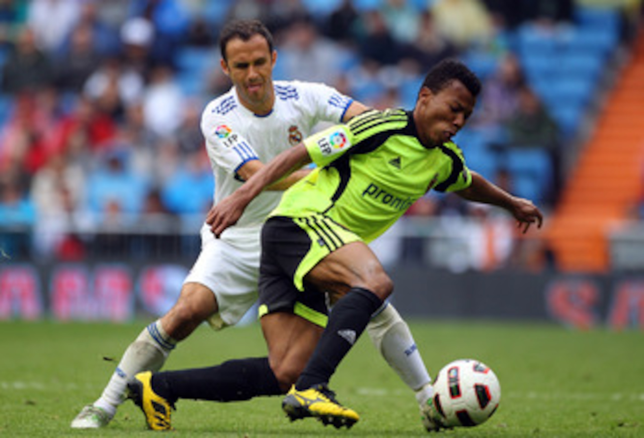 MADRID, SPAIN - APRIL 30: Ricardo Carvalho of Real Madrid battles with Uche of Real Zaragoza during the La Liga match between Real Madrid and Real Zaragoza at Estadio Santiago Bernabeu on April 30, 2011 in Madrid, Spain. (Photo by Julian Finney/Getty Im MADRID, SPAIN - APRIL 30: Ricardo Carvalho of Real Madrid battles with Uche of Real Zaragoza during the La Liga match between Real Madrid and Real Zaragoza at Estadio Santiago Bernabeu on April 30, 2011 in Madrid, Spain. (Photo by Julian Finney/Getty Im