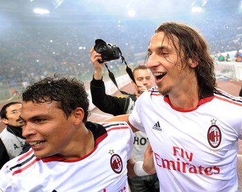 ROME, ITALY - MAY 07:  Thiago Silva and Zlatan Ibrahimovic of Milan celebrate the victory after the Serie A match between AS Roma and AC Milan at Stadio Olimpico on May 7, 2011 in Rome, Italy.  (Photo by Giuseppe Bellini/Getty Images)