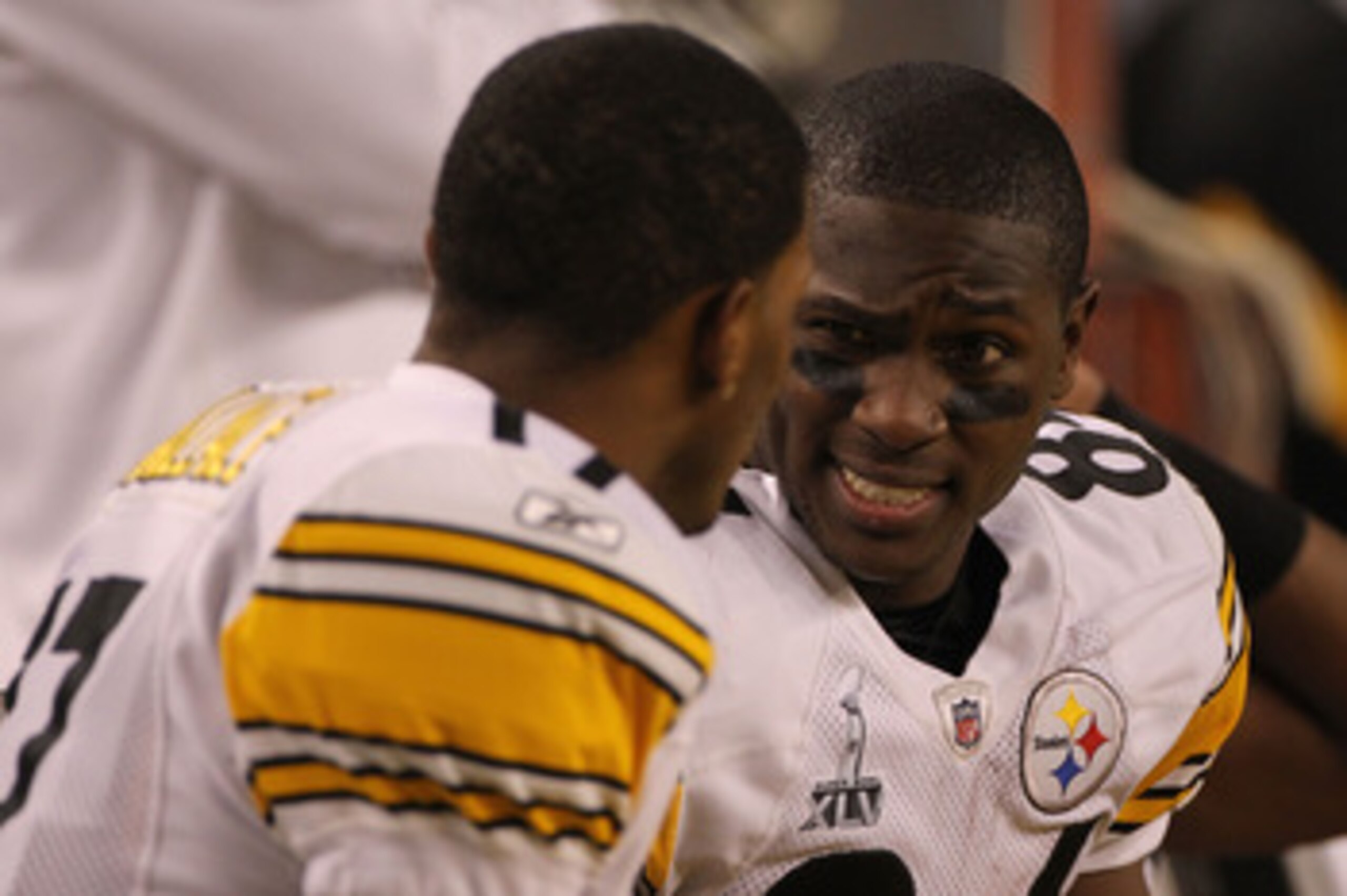 ARLINGTON, TX - FEBRUARY 06: Emmanuel Sanders #88 of the Pittsburgh Steelers talks with Mike Wallace #17 on the bench against the Green Bay Packers during Super Bowl XLV at Cowboys Stadium on February 6, 2011 in Arlington, Texas. (Photo by Doug Pensinge ARLINGTON, TX - FEBRUARY 06: Emmanuel Sanders #88 of the Pittsburgh Steelers talks with Mike Wallace #17 on the bench against the Green Bay Packers during Super Bowl XLV at Cowboys Stadium on February 6, 2011 in Arlington, Texas. (Photo by Doug Pensinge