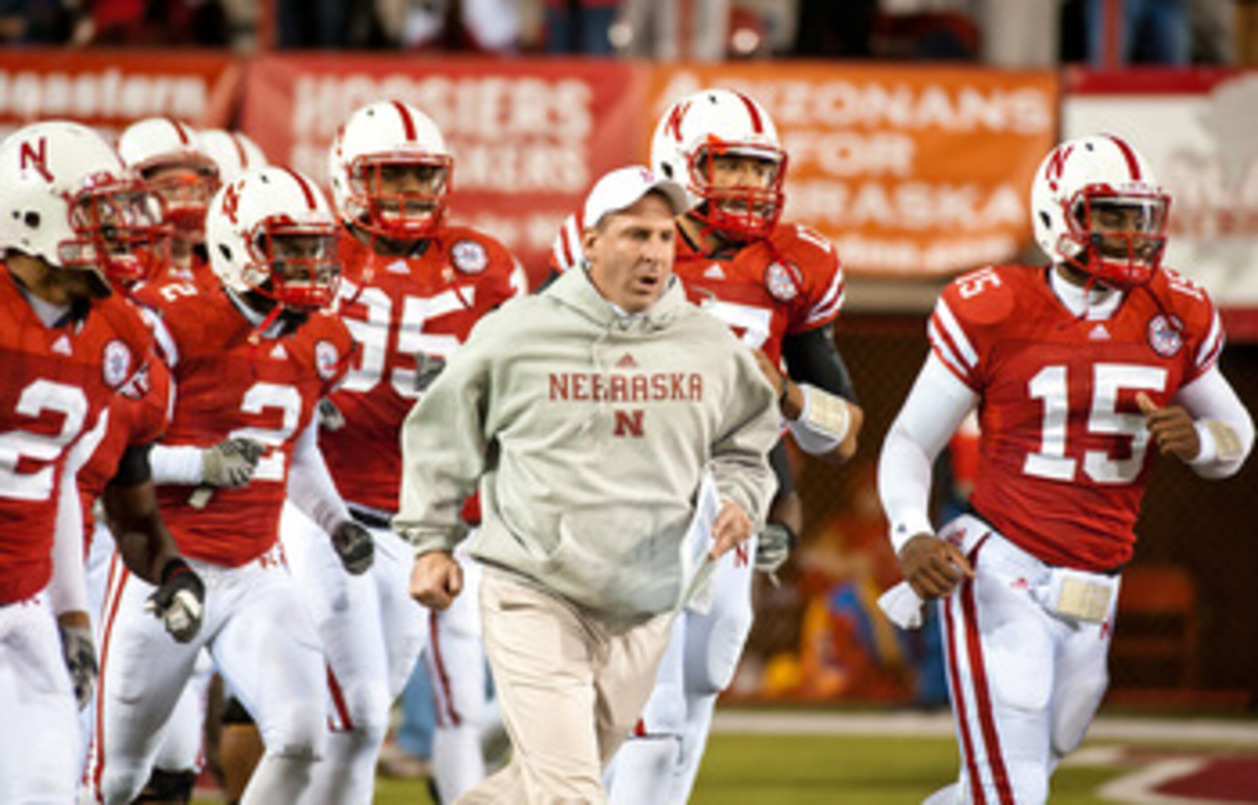 LINCOLN, NE - NOVEMBER 13: Coach Bo Pelini of the Nebraska Cornhuskers leads his team onto the field to play the Kansas Jayhawks at Memorial Stadium on November 13, 2010 in Lincoln, Nebraska. Nebraska Defeated Kansas 20-3. (Photo by Eric Francis/Getty Ima