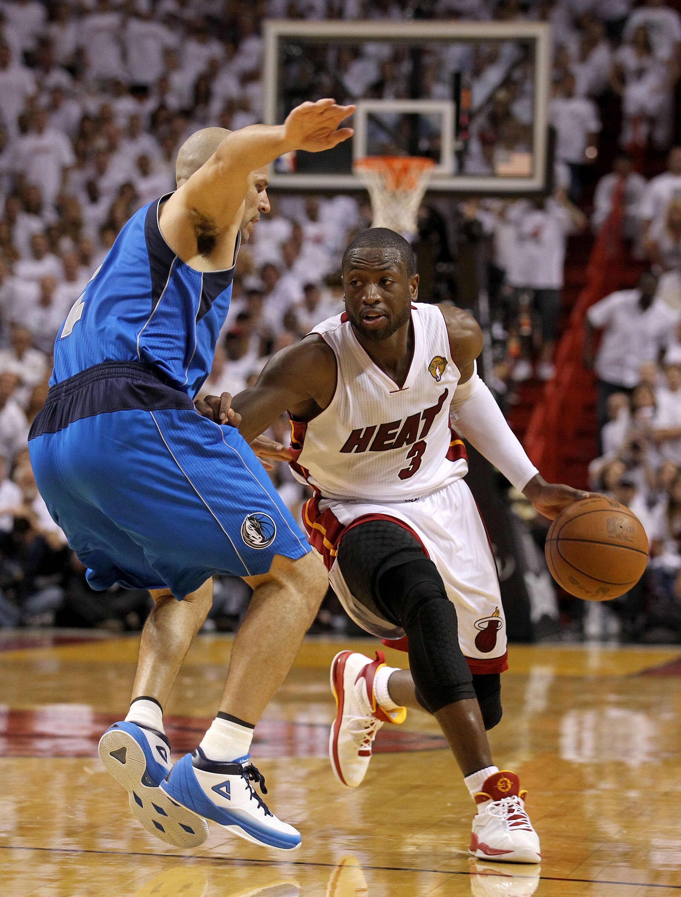 MIAMI, FL - MAY 31:  Dwyane Wade #3 of the Miami Heat drives on Jason Kidd #2 of the Dallas Mavericks in the fourth quarter in Game One of the 2011 NBA Finals at American Airlines Arena on May 31, 2011 in Miami, Florida. NOTE TO USER: User expressly ackno