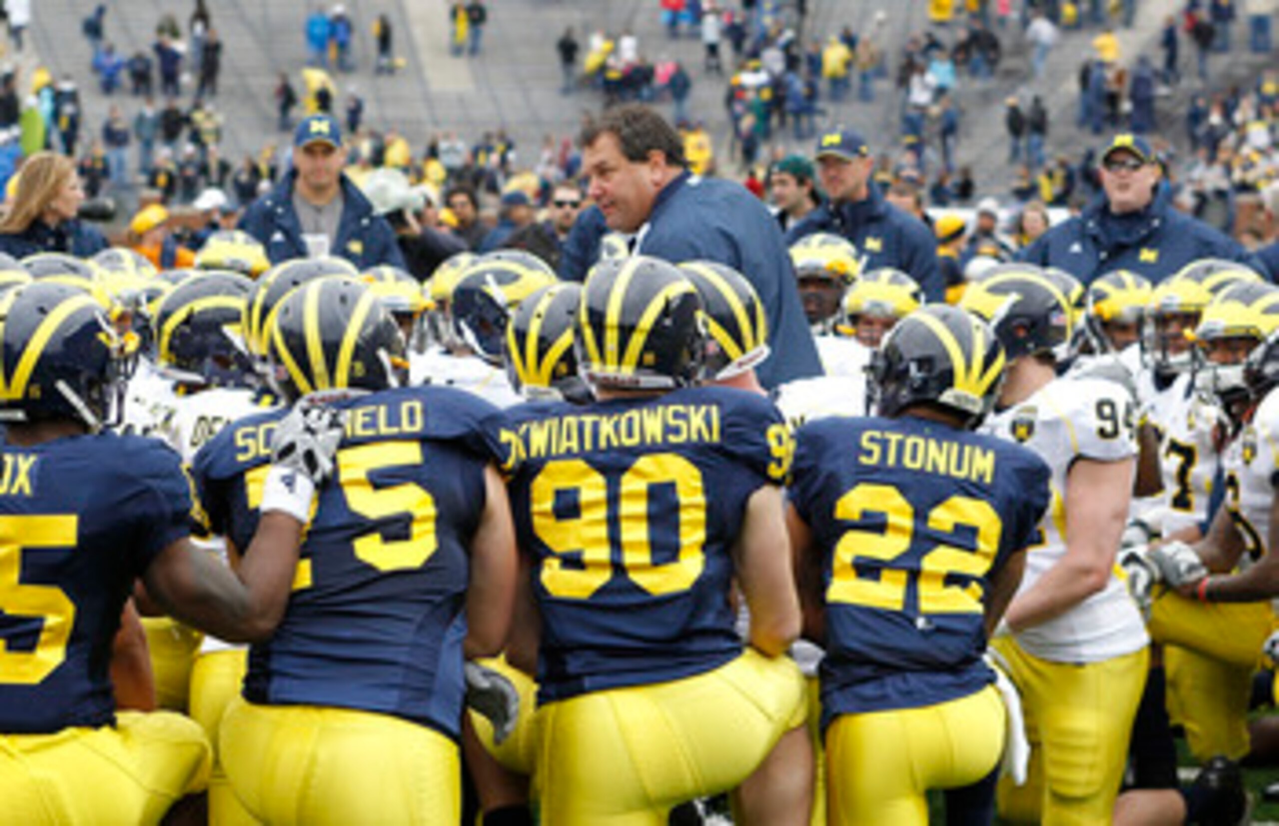 ANN ARBOR, MI - APRIL 16:  Head football coach Brady Hoke talks with his team during the annual Spring Game at Michigan Stadium on April 16, 2011 in Ann Arbor, Michigan.  (Photo by Leon Halip/Getty Images)