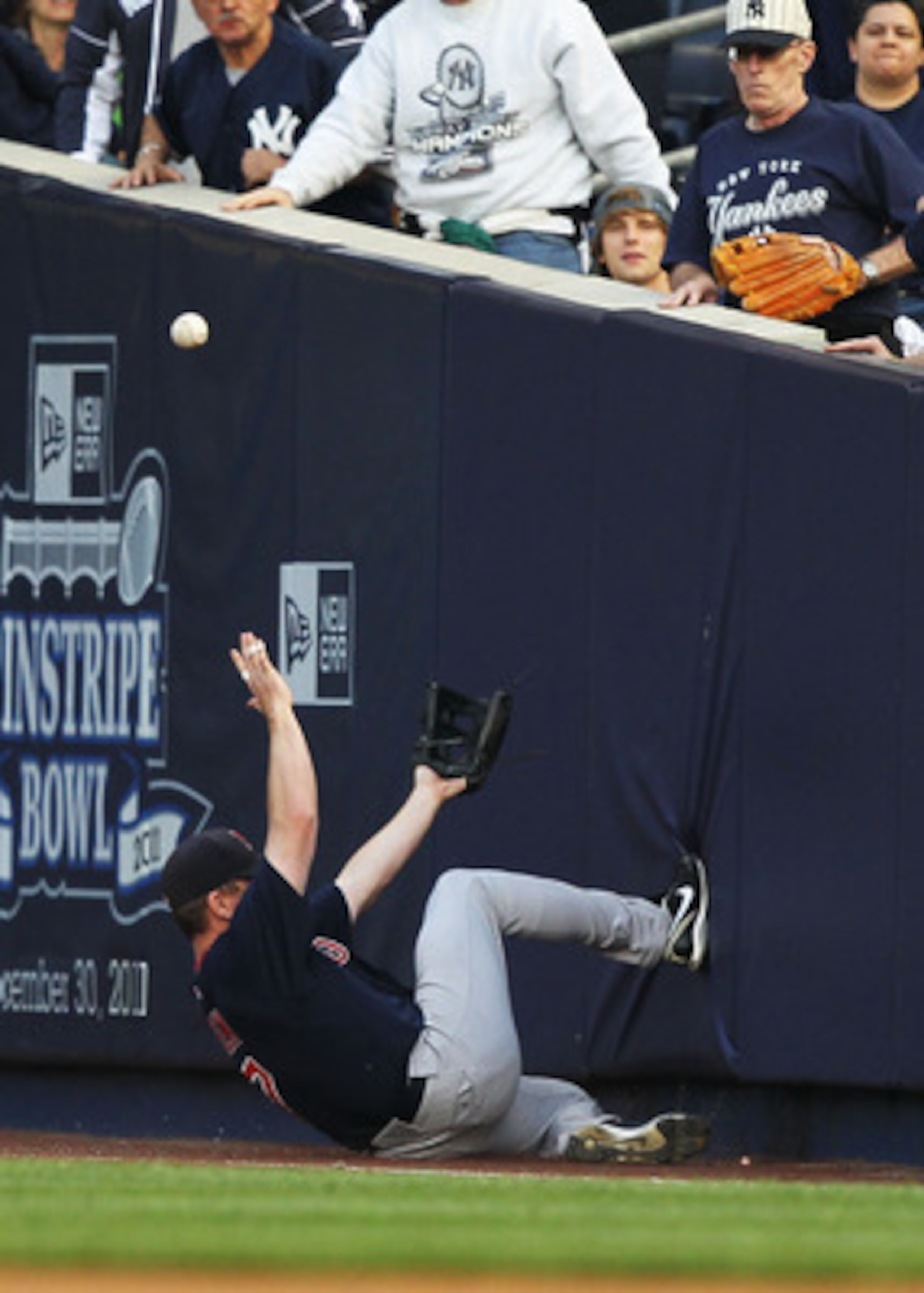 NEW YORK, NY - MAY 13:  J.D. Drew #7 of the Boston Red Sox cannot catch a foul ball hit  by Curtis Granderson #14 of the New York Yankees during their game on May 13, 2011 at Yankee Stadium in the Bronx borough of New York City.  (Photo by Al Bello/Getty 