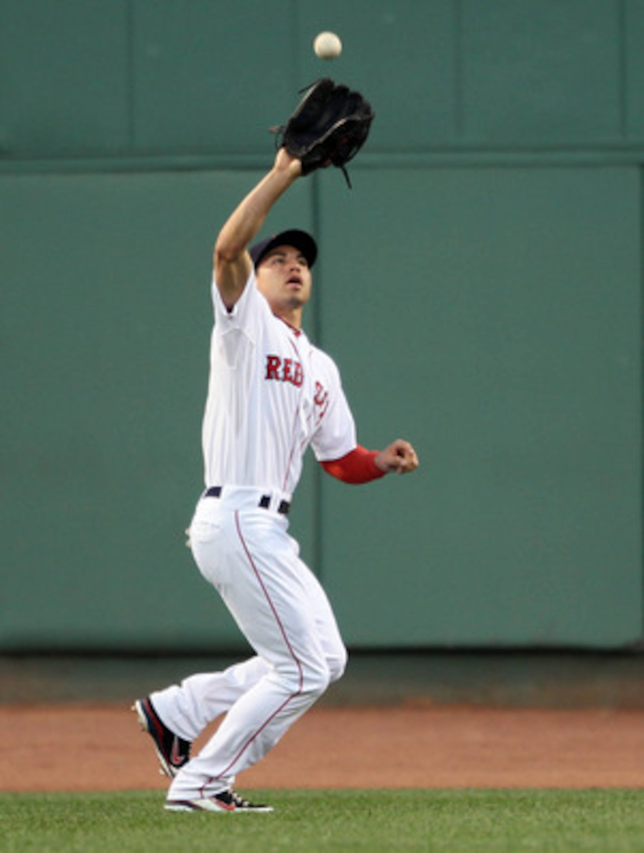 BOSTON, MA - MAY 31:  Jacoby Ellsbury #2 of the Boston Red Sox makes the catch for the out in the third inning against the Chicago White Sox on May 31, 2011 at Fenway Park in Boston, Massachusetts.  (Photo by Elsa/Getty Images)