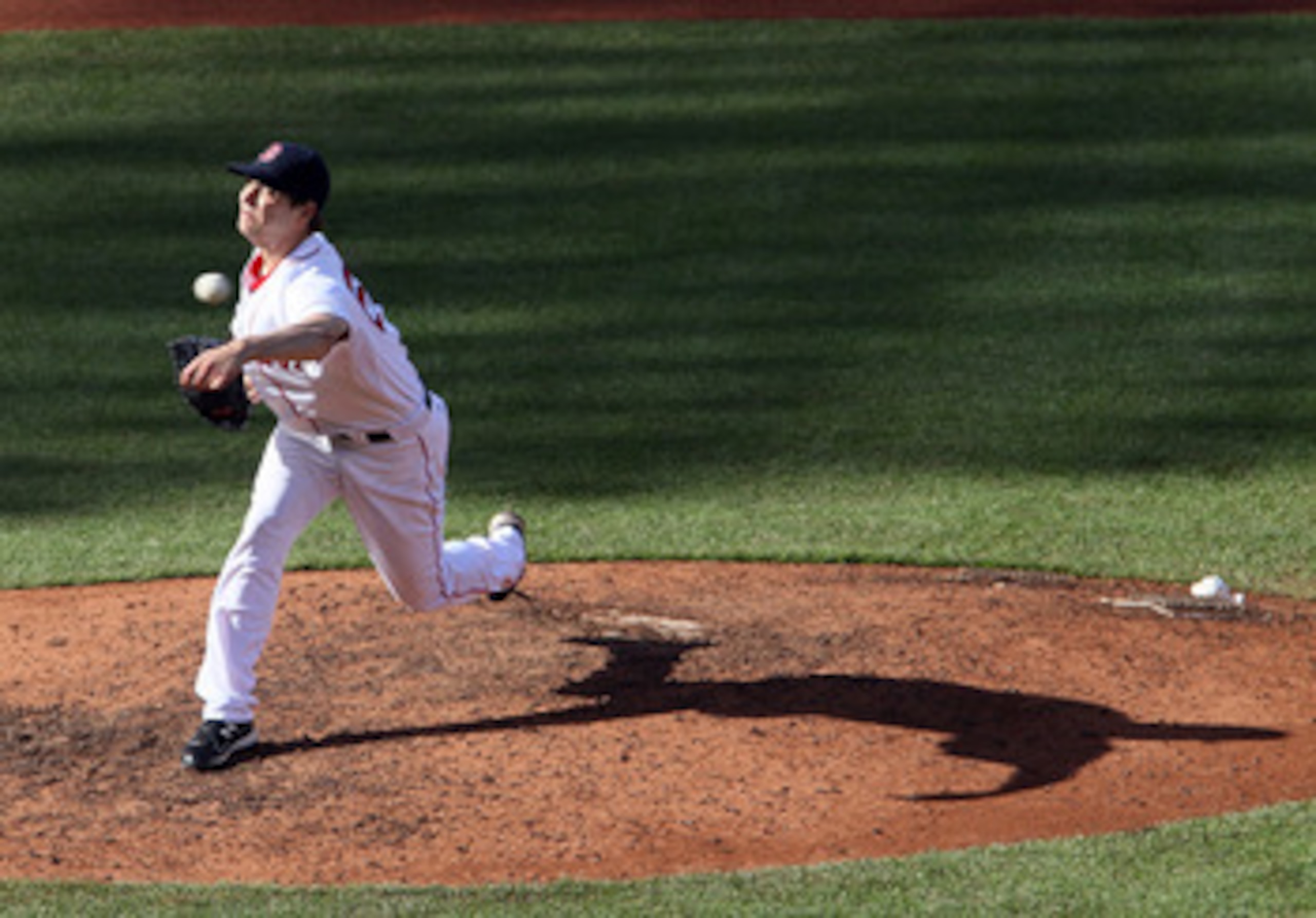 BOSTON, MA - MAY 05:  Rich Hill #53 of the Boston Red Sox delivers a pitch in the ninth inning against the Los Angeles Angels on May 5, 2011 at Fenway Park in Boston, Massachusetts. The Los Angeles Angels defeated the Boston Red Sox 11-0.  (Photo by Elsa/