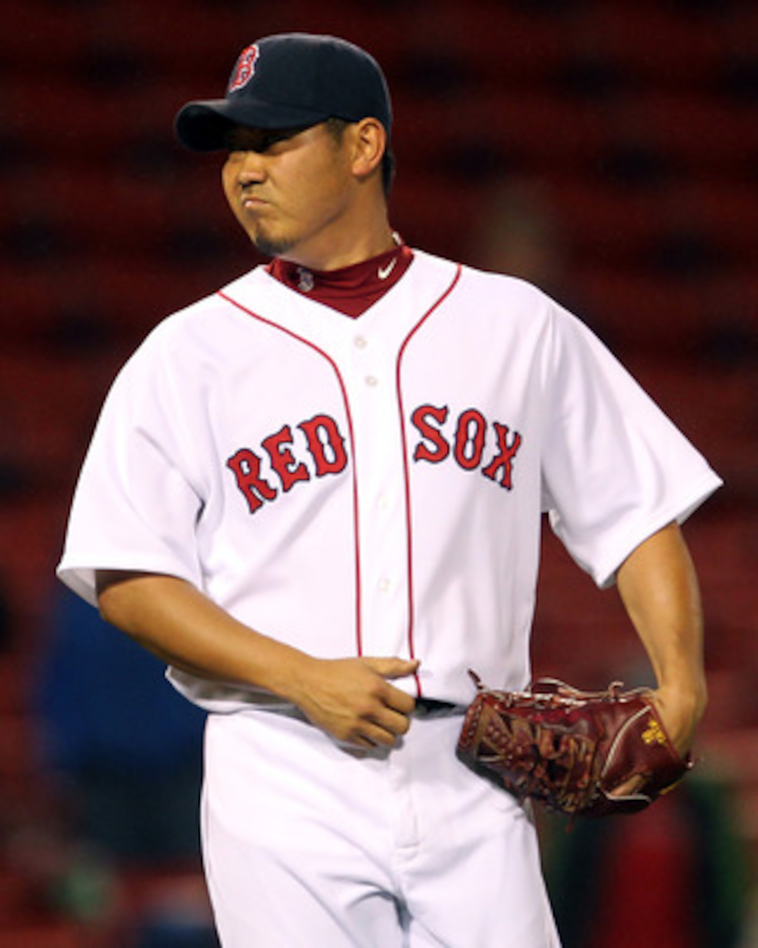BOSTON, MA - MAY 04:  Daisuke Matsuzaka #18 of the Boston Red Sox reacts after giving up a single to Peter Bourjos #25 of the Los Angeles Angels of Anaheim in the 13th inning at Fenway Park on May 4, 2011 in Boston, Massachusetts. (Photo by Jim Rogash/Get