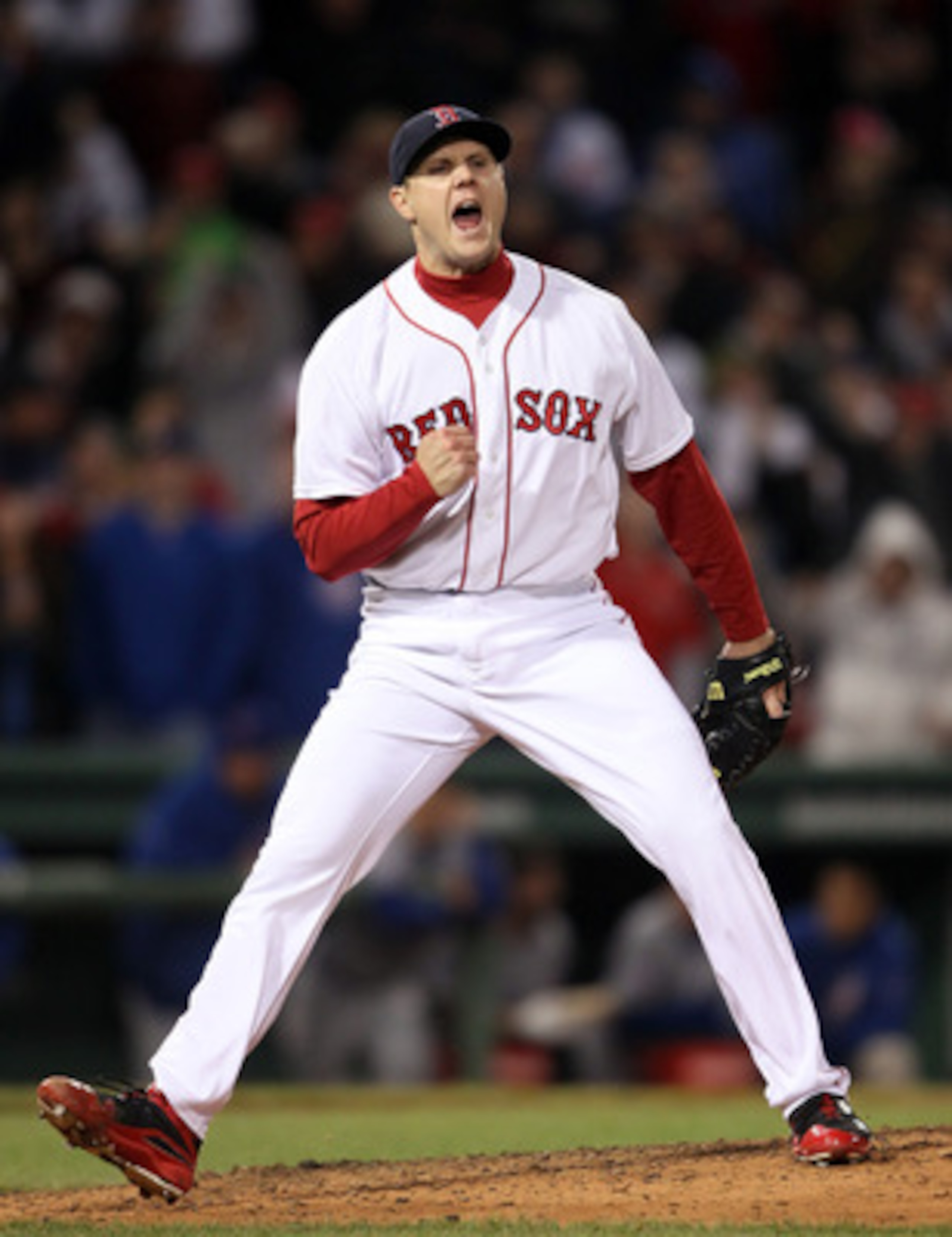 BOSTON, MA - MAY 22: Jonathan Papelbon #58 of the Boston Red Sox celebrates the win over the Chicago Cubs on May 22, 2011 at Fenway Park in Boston, Massachusetts.  Before this series, the two teams haven't played at Fenway Park since the 1918 World Series