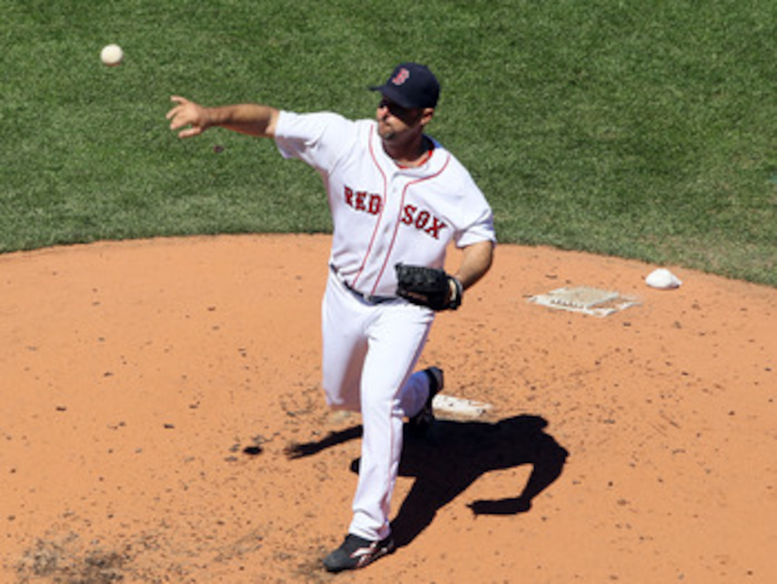 BOSTON, MA - MAY 01:  Tim Wakefield #49 of the Boston Red Sox delivers a pitch against the Seattle Mariners on May 1, 2011 at Fenway Park in Boston, Massachusetts.  (Photo by Elsa/Getty Images)