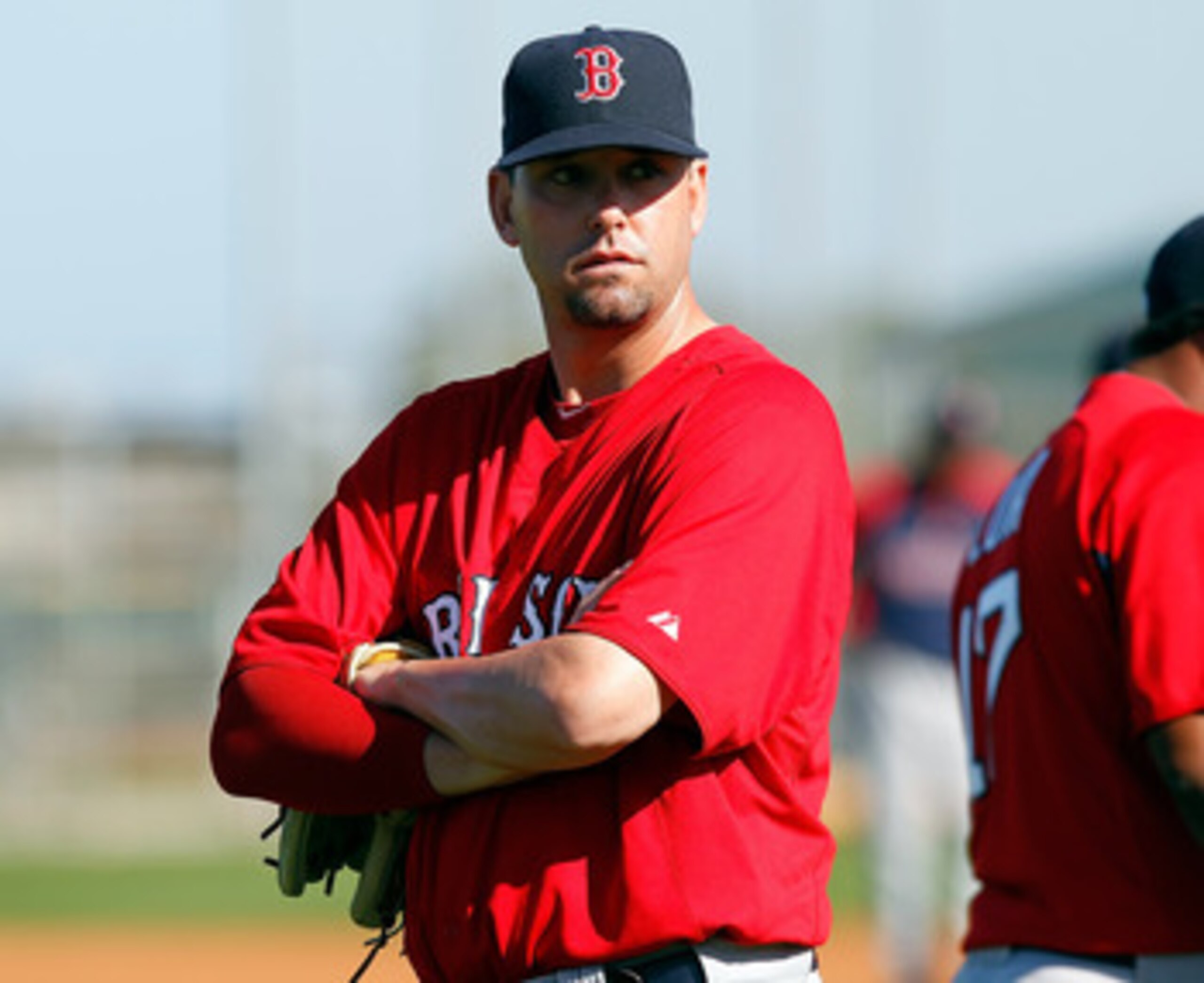FORT MYERS, FL - FEBRUARY 19:  Pitcher Dan Wheeler #36 of the Boston Red Sox warms up during a Spring Training Workout Session at the Red Sox Player Development Complex on February 19, 2011 in Fort Myers, Florida.  (Photo by J. Meric/Getty Images)