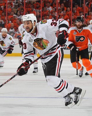 PHILADELPHIA - JUNE 09:  Dustin Byfuglien #33 of the Chicago Blackhawks skates against the Philadelphia Flyers during Game Six of the 2010 NHL Stanley Cup Final at the Wachovia Center on June 9, 2010 in Philadelphia, Pennsylvania.  (Photo by Bruce Bennett