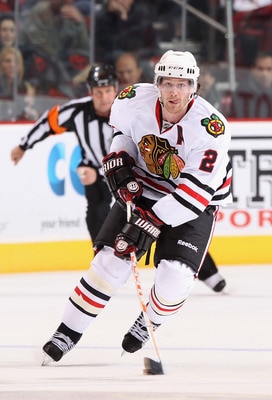 GLENDALE, AZ - MARCH 20:  Duncan Keith #2 of the Chicago Blackhawks skates with the puck during the NHL game against the Phoenix Coyotes at Jobing.com Arena on March 20, 2011 in Glendale, Arizona. The Blackhawks defeated the Coyotes 2-1.  (Photo by Christ