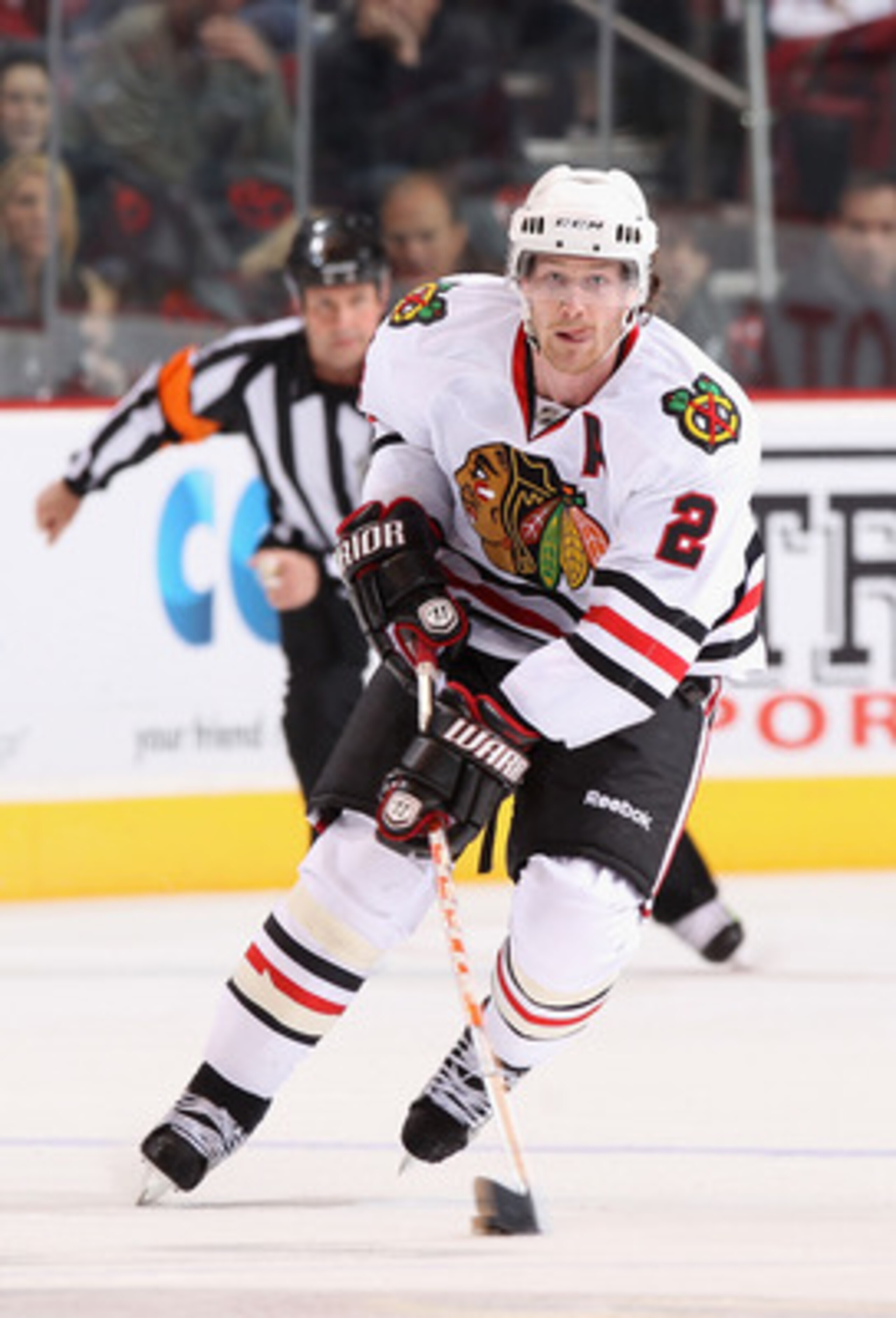 GLENDALE, AZ - MARCH 20:  Duncan Keith #2 of the Chicago Blackhawks skates with the puck during the NHL game against the Phoenix Coyotes at Jobing.com Arena on March 20, 2011 in Glendale, Arizona. The Blackhawks defeated the Coyotes 2-1.  (Photo by Christ