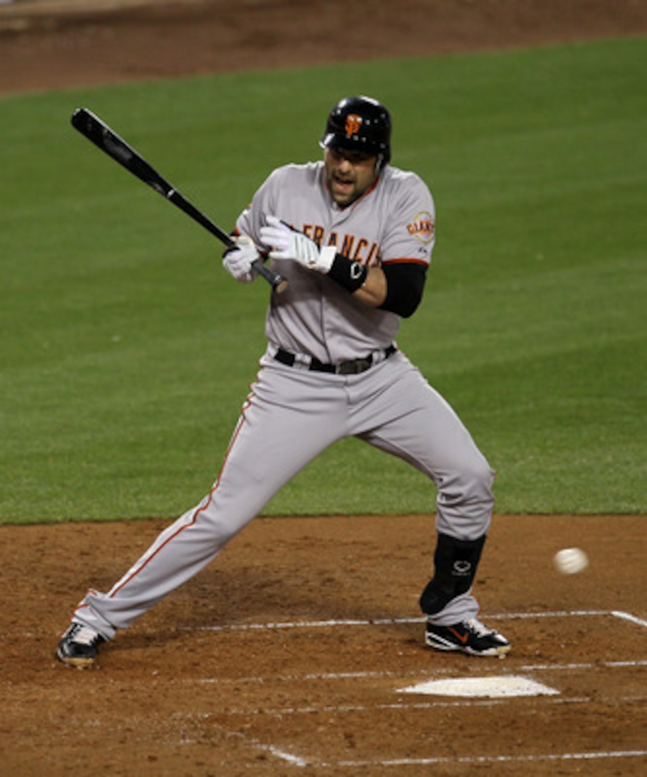 LOS ANGELES, CA - MAY 18:  Mark DeRosa #7 of the San Francisco Giants reacxts after being hit by his own foul ball in the fourth inning against the Los Angeles Dodgers on May 18, 2011 at Dodger Stadium in Los Angeles, California. DeRosa had to leave the g
