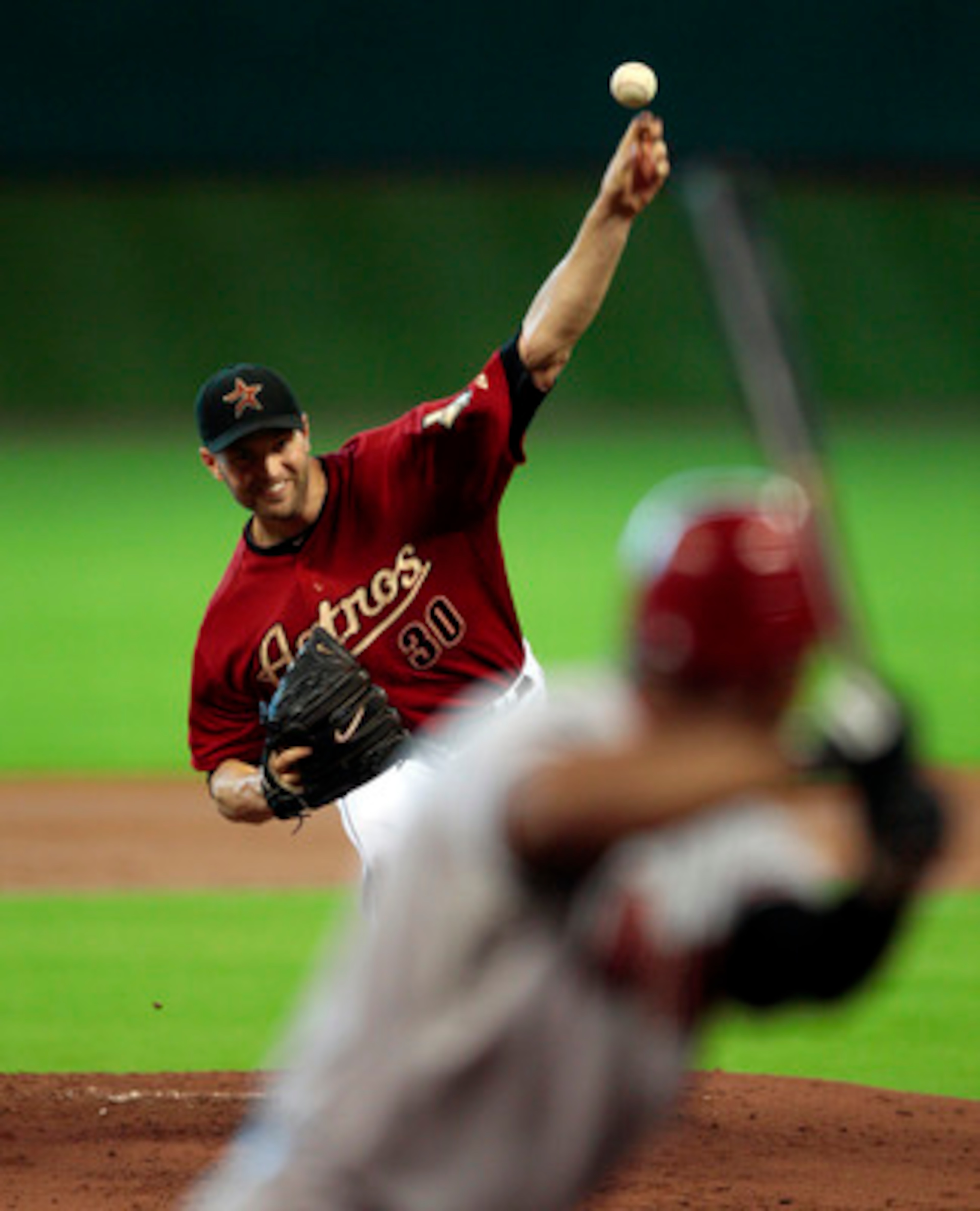 HOUSTON - MAY 29:  Pitcher J.A. Happ #30 of the Houston Astros throws in the first inning against the Arizona Diamondbacks at Minute Maid Park on May 29, 2011 in Houston, Texas.  (Photo by Bob Levey/Getty Images)