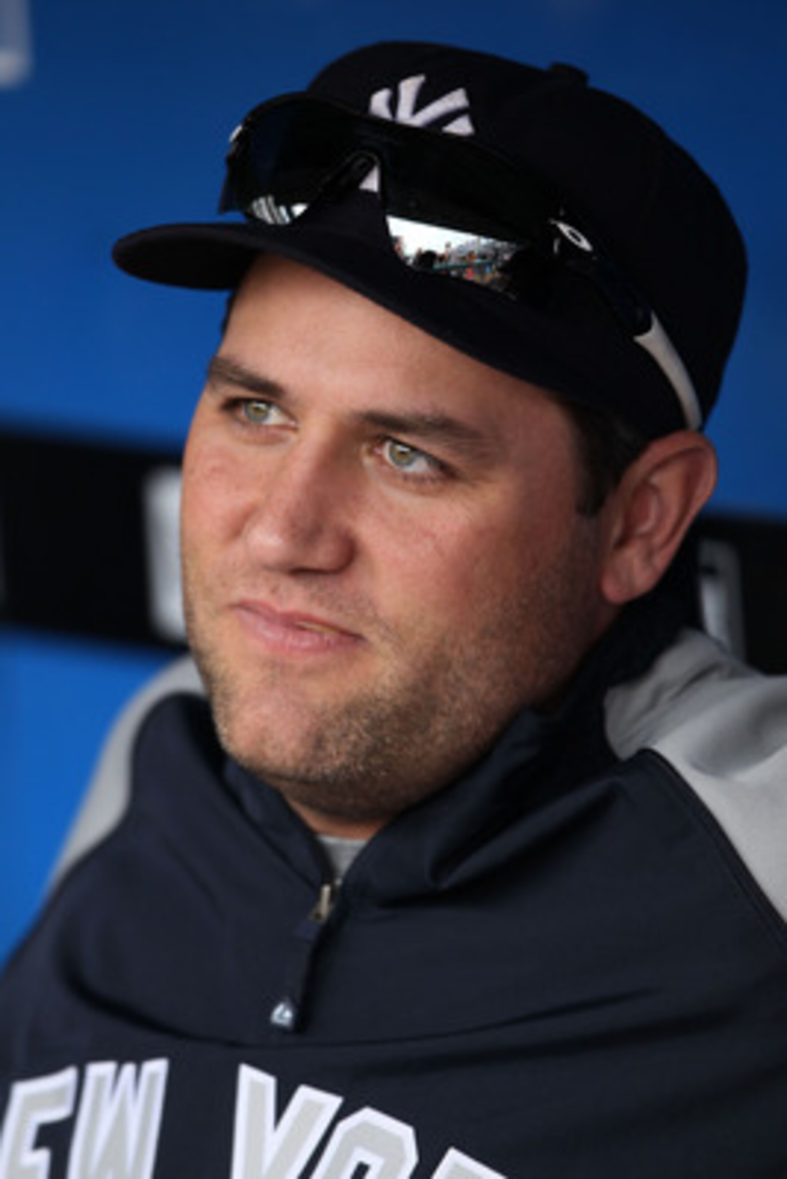 ARLINGTON, TX - OCTOBER 22: Lance Berkman #17 of the New York Yankees sits in the dugout prior to playing the Texas Rangers in Game Six of the ALCS during the 2010 MLB Playoffs at Rangers Ballpark in Arlington on October 22, 2010 in Arlington, Texas. (P ARLINGTON, TX - OCTOBER 22: Lance Berkman #17 of the New York Yankees sits in the dugout prior to playing the Texas Rangers in Game Six of the ALCS during the 2010 MLB Playoffs at Rangers Ballpark in Arlington on October 22, 2010 in Arlington, Texas. (P
