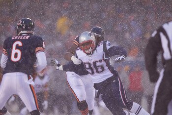 CHICAGO, IL - DECEMBER 12: Jermaine Cunningham #96 of the New England Patriots rushes the quarterback against the Chicago Bears at Soldier Field on December 12, 2010 in Chicago, Illinois.  The Patriots beat the Bears 36-7.  (Photo by Dilip Vishwanat/Getty