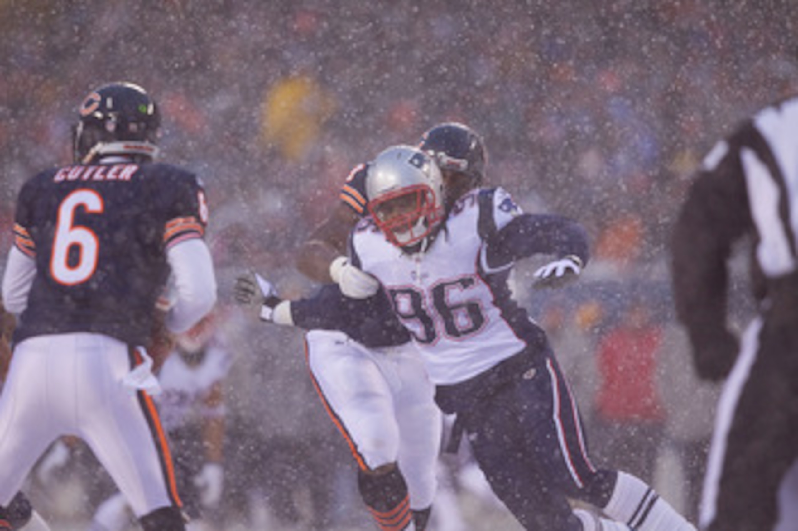CHICAGO, IL - DECEMBER 12: Jermaine Cunningham #96 of the New England Patriots rushes the quarterback against the Chicago Bears at Soldier Field on December 12, 2010 in Chicago, Illinois. The Patriots beat the Bears 36-7. (Photo by Dilip Vishwanat/Getty CHICAGO, IL - DECEMBER 12: Jermaine Cunningham #96 of the New England Patriots rushes the quarterback against the Chicago Bears at Soldier Field on December 12, 2010 in Chicago, Illinois. The Patriots beat the Bears 36-7. (Photo by Dilip Vishwanat/Getty