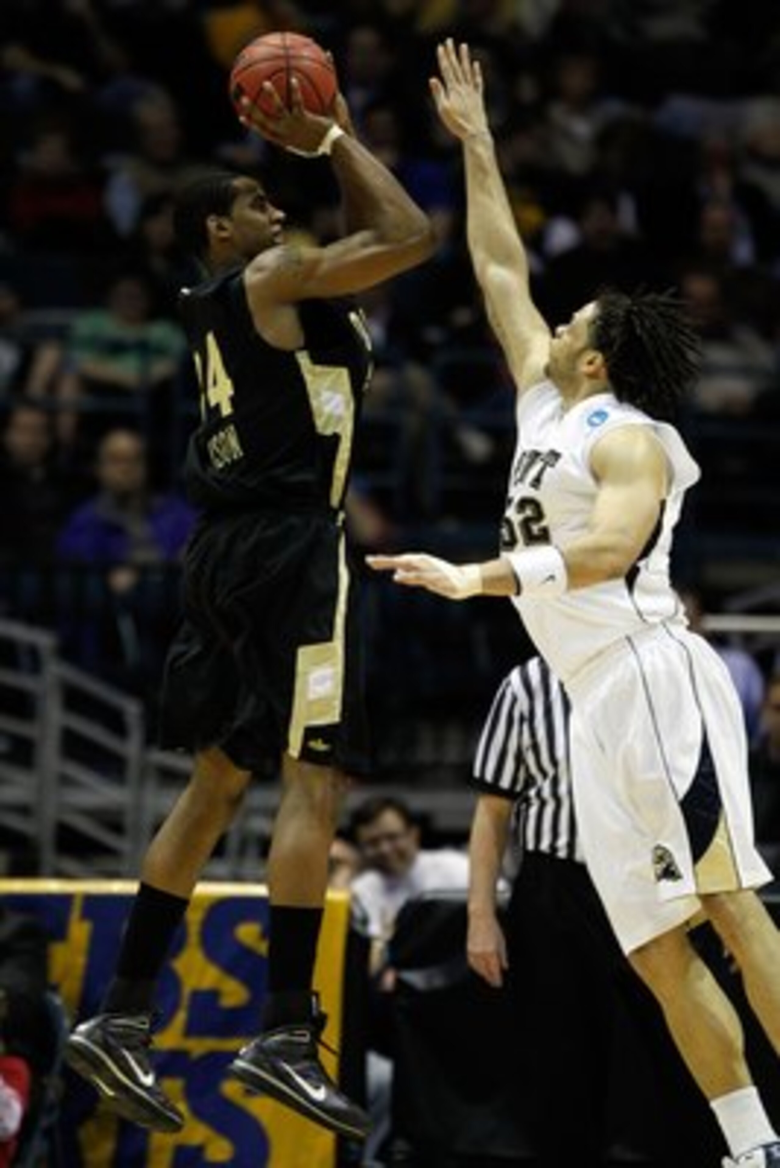 MILWAUKEE - MARCH 19:  Keith Benson #34 of the Oakland Golden Grizzlies shoots the ball over Gary McGhee #52 of the Pittsburgh Panthers in the second half during the first round of the 2010 NCAA men's basketball tournament at the Bradley Center on March 1