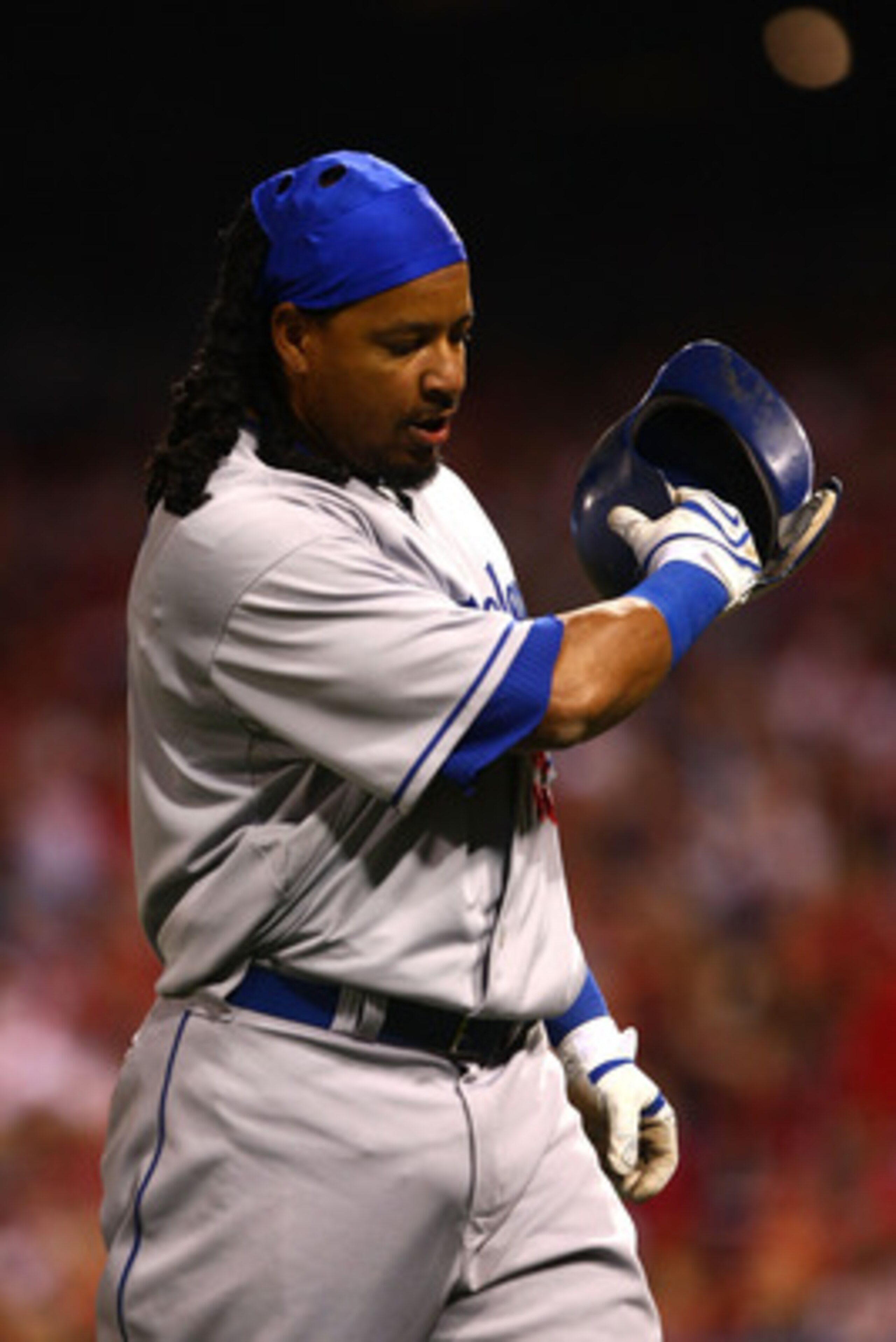 PHILADELPHIA - OCTOBER 21: Manny Rameriz #99 of the Los Angeles Dodgers walks back to the dugout walks back to the dugout after striking out against the Philadelphia Phillies in Game Five of the NLCS during the 2009 MLB Playoffs at Citizens Bank Park on PHILADELPHIA - OCTOBER 21: Manny Rameriz #99 of the Los Angeles Dodgers walks back to the dugout walks back to the dugout after striking out against the Philadelphia Phillies in Game Five of the NLCS during the 2009 MLB Playoffs at Citizens Bank Park on