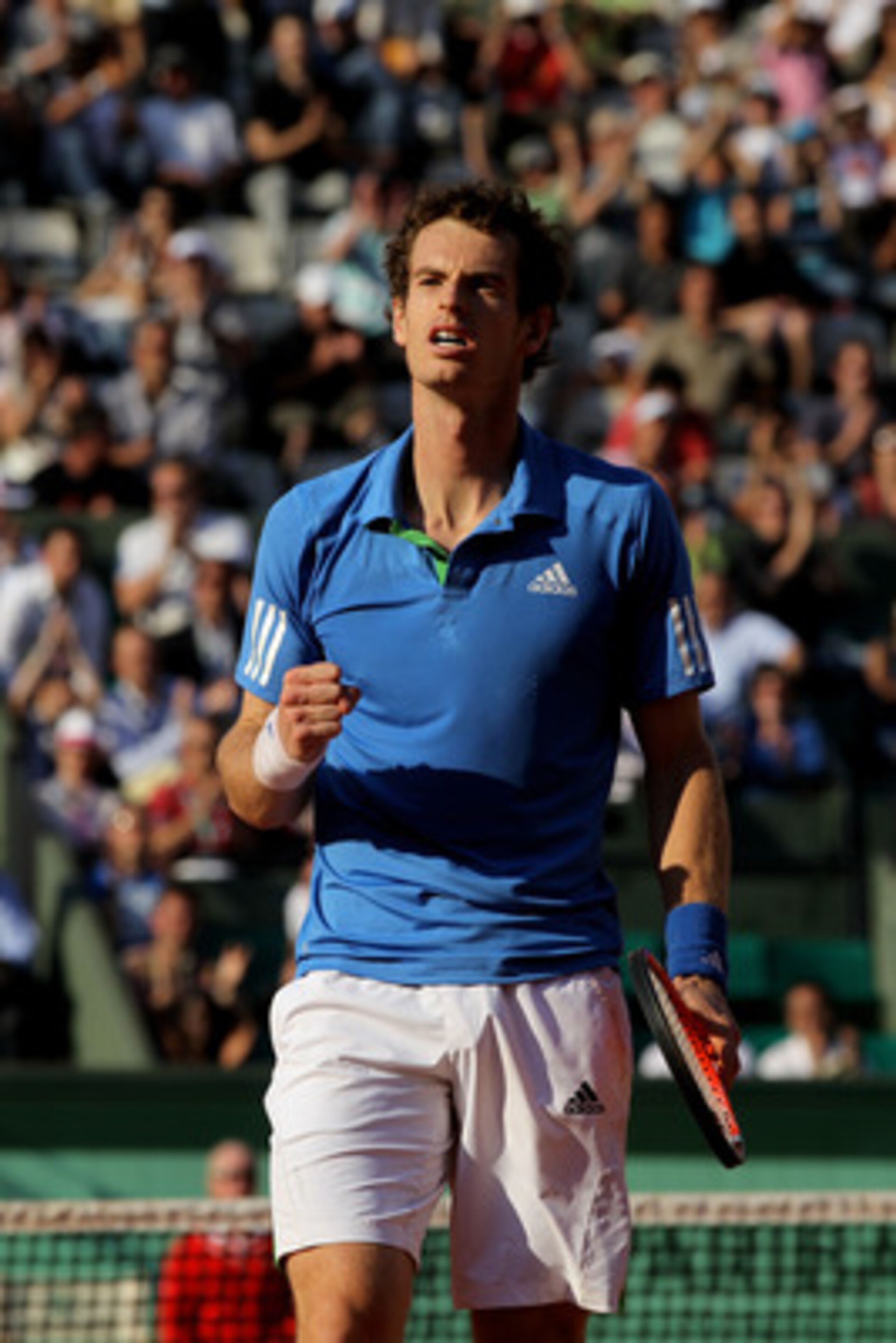 PARIS, FRANCE - JUNE 01:  Andy Murray of Great Britain celebrates matchpoint during the men's singles quarterfinal match between Andy Murray of Great Britain and Juan Ignacio Chela of Argentina on day eleven of the French Open at Roland Garros on June 1, 