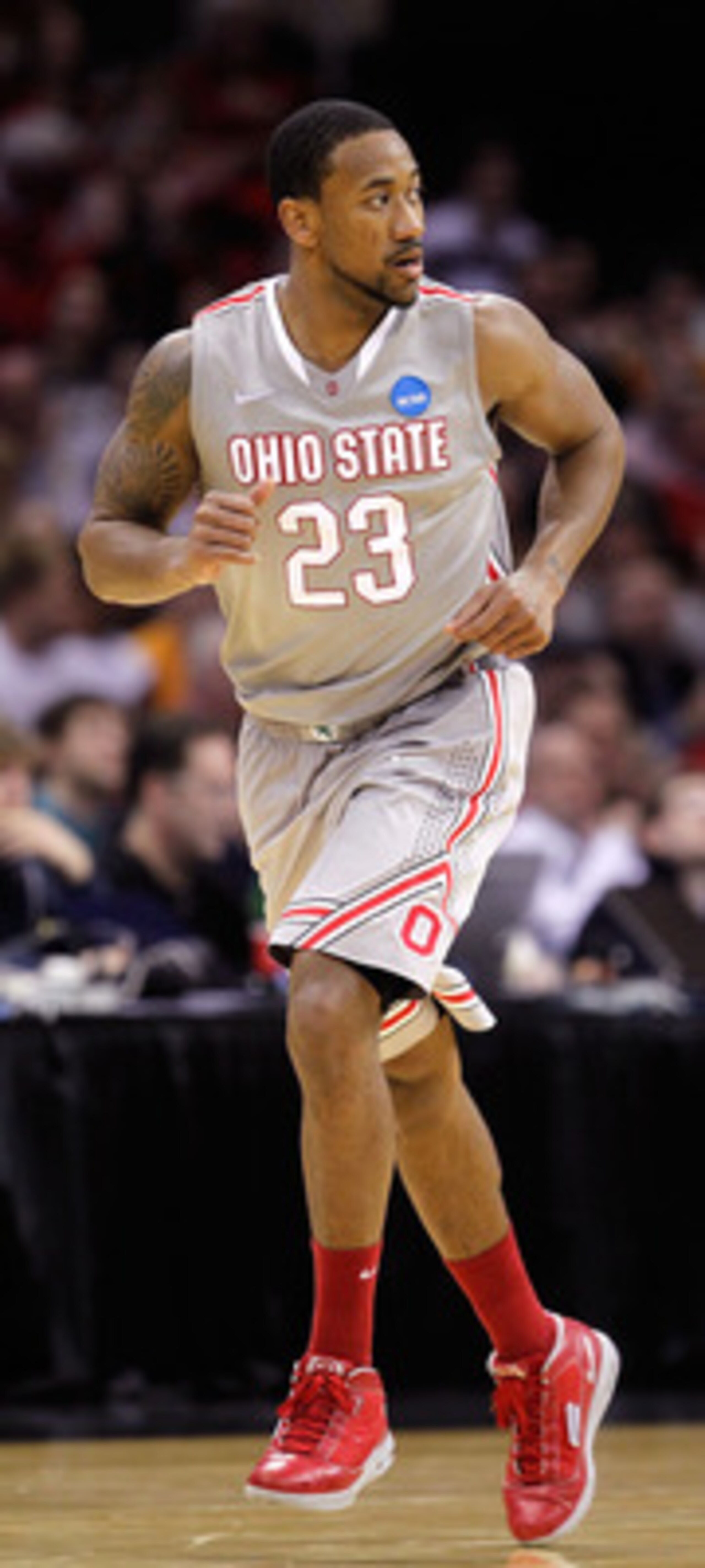 CLEVELAND, OH - MARCH 20: David Lighty #23 of the Ohio State Buckeyes runs up court after a play against the George Mason Patriots during the third of the 2011 NCAA men's basketball tournament at Quicken Loans Arena on March 20, 2011 in Cleveland, Ohio. CLEVELAND, OH - MARCH 20: David Lighty #23 of the Ohio State Buckeyes runs up court after a play against the George Mason Patriots during the third of the 2011 NCAA men's basketball tournament at Quicken Loans Arena on March 20, 2011 in Cleveland, Ohio.
