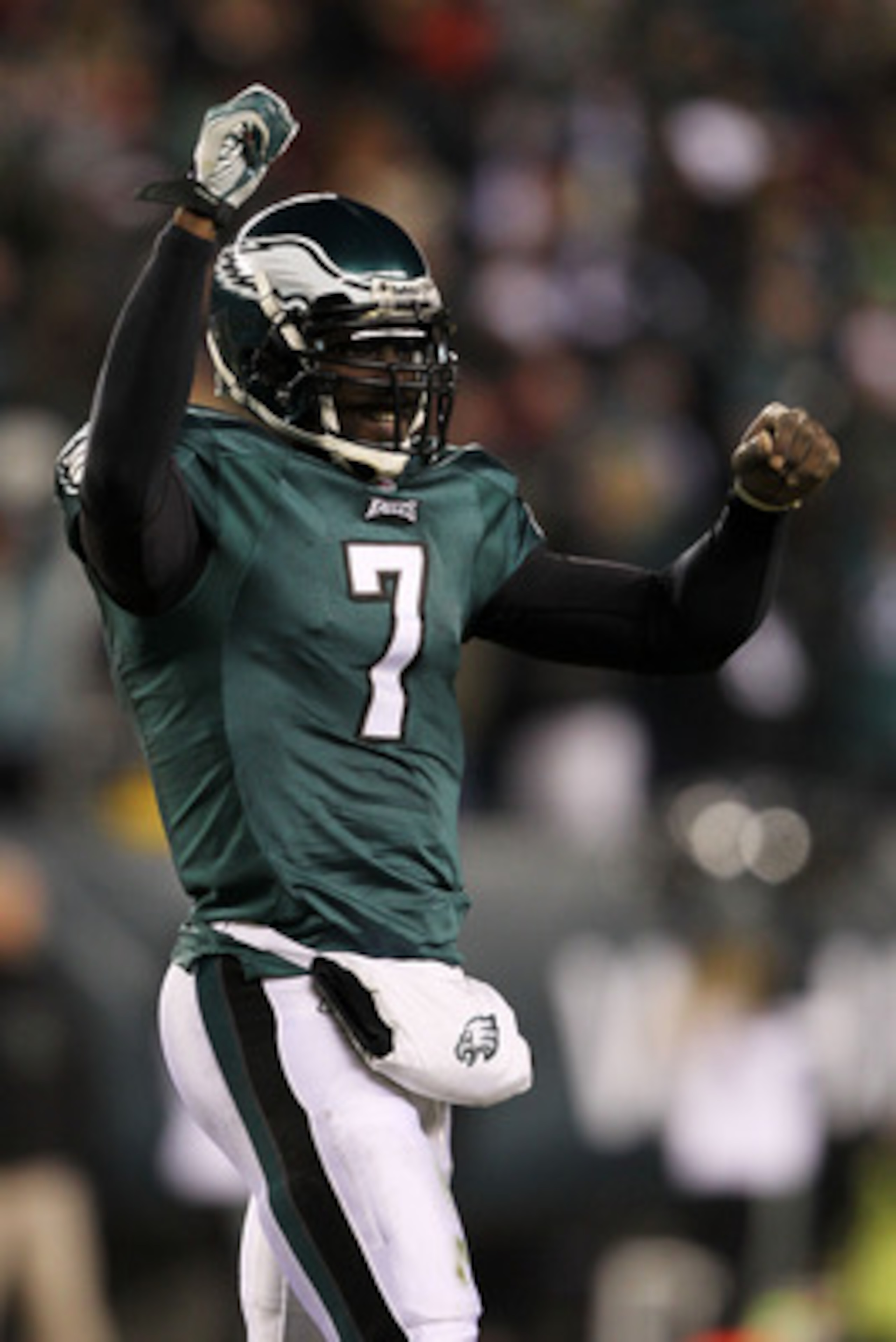 PHILADELPHIA, PA - JANUARY 09:  Michael Vick #7 of the Philadelphia Eagles reacts as they play against the Green Bay Packers during the 2011 NFC wild card playoff game at Lincoln Financial Field on January 9, 2011 in Philadelphia, Pennsylvania.  (Photo by
