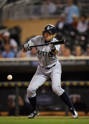 MINNEAPOLIS, MN - MAY 23: Ichiro Suzuki #51 of the Seattle Mariners bunts against the Minnesota Twins during their game on May 23, 2011 at Target Field in Minneapolis, Minnesota. The Rockies won 6-5. (Photo by Hannah Foslien/Getty Images)