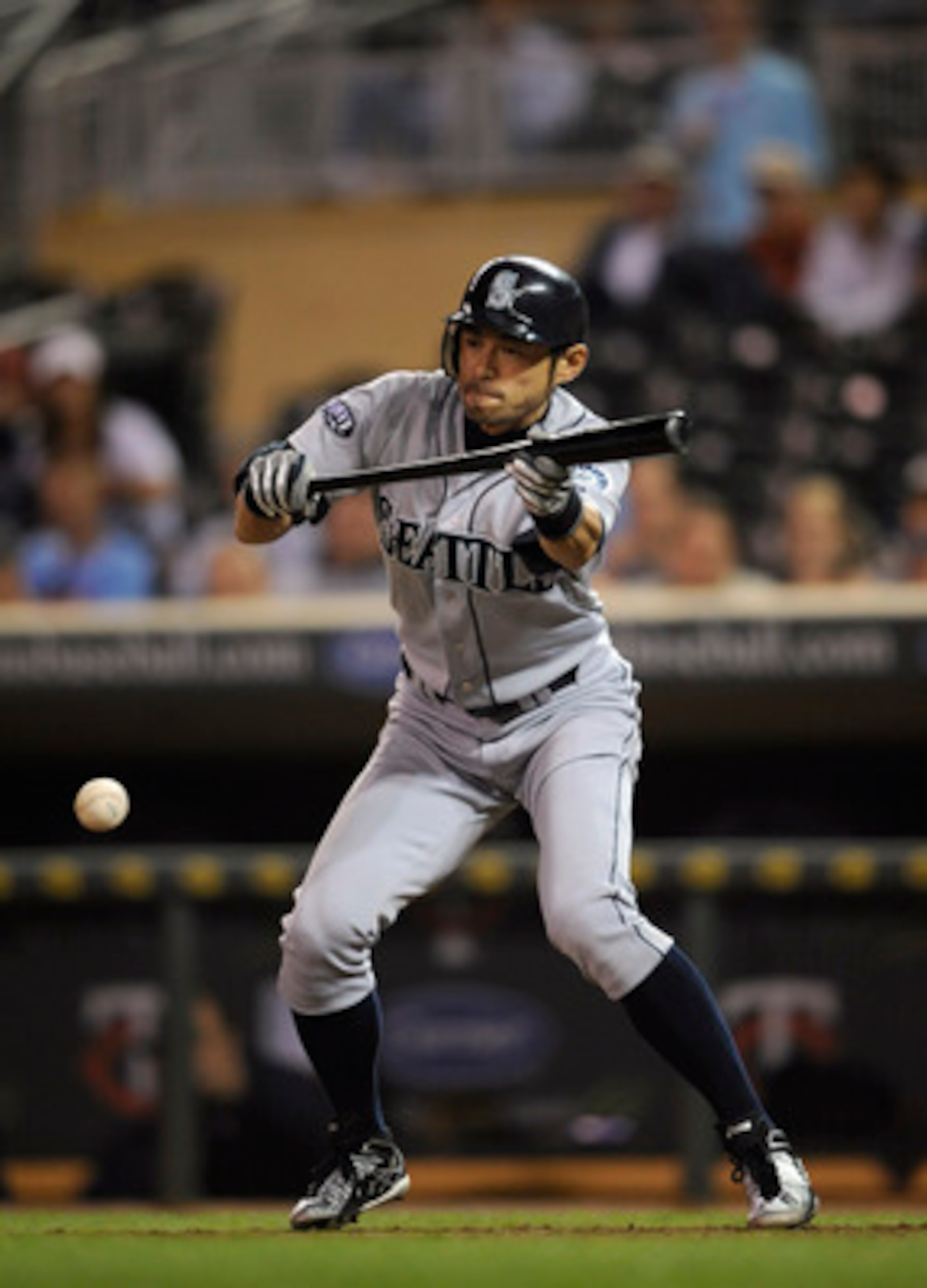 MINNEAPOLIS, MN - MAY 23: Ichiro Suzuki #51 of the Seattle Mariners bunts against the Minnesota Twins during their game on May 23, 2011 at Target Field in Minneapolis, Minnesota. The Rockies won 6-5. (Photo by Hannah Foslien/Getty Images)