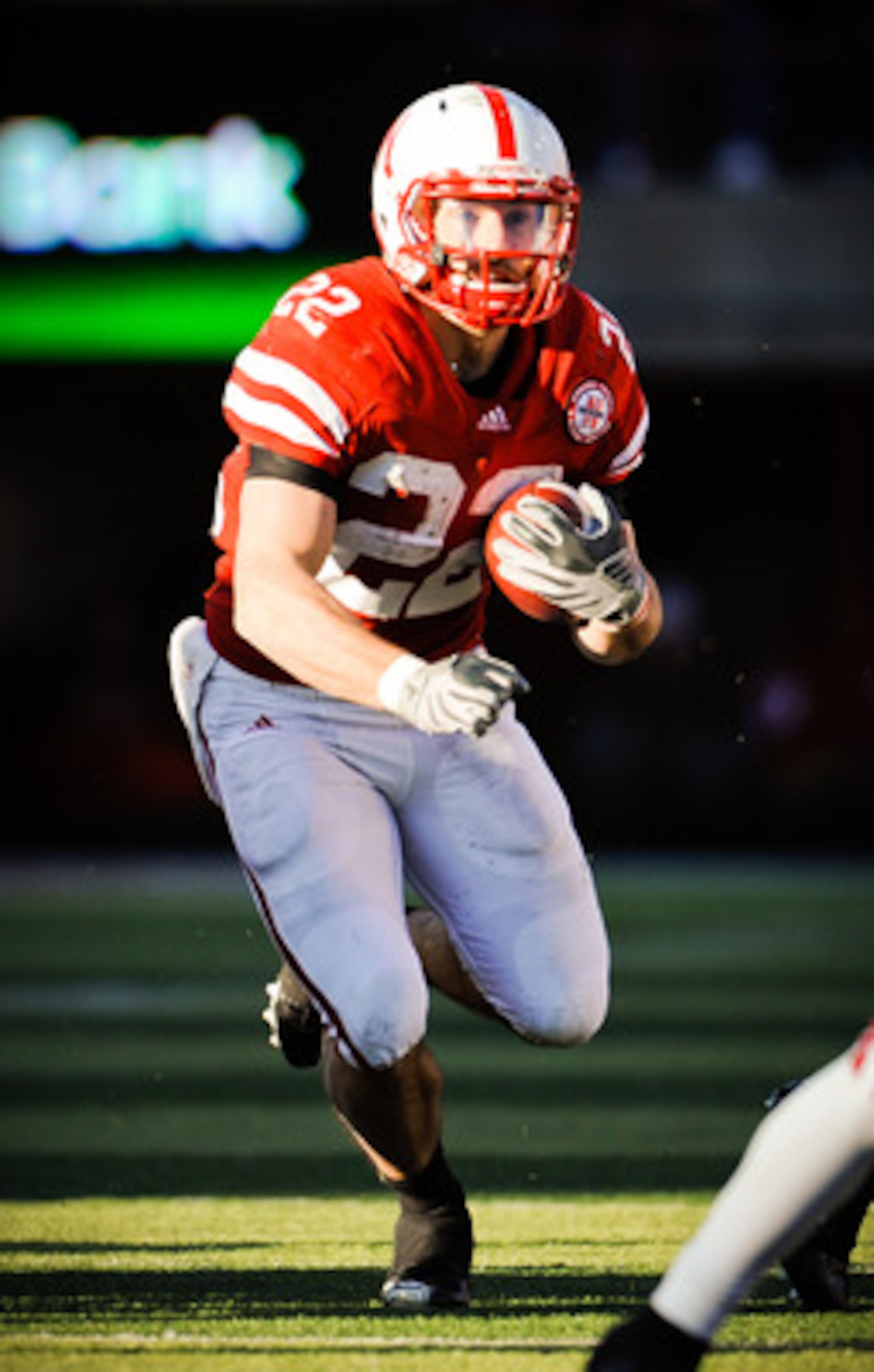 LINCOLN, NE - NOVEMBER 26: Rex Burkhead #22 of the Nebraska Cornhuskers runs the ball during their game at Memorial Stadium on November 26, 2010 in Lincoln, Nebraska. Nebraska defeated Colorado 45-17 (Photo by Eric Francis/Getty Images)