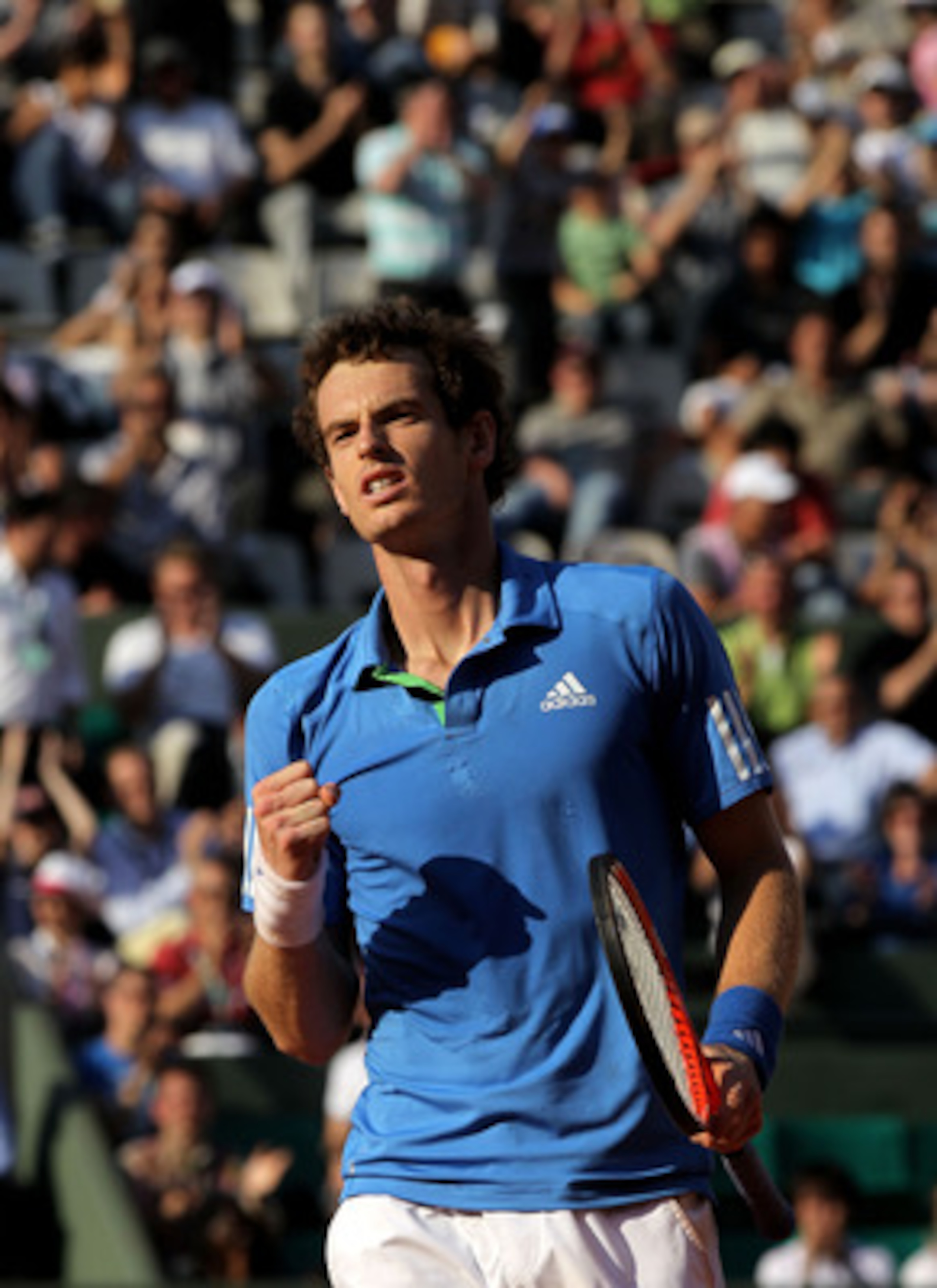PARIS, FRANCE - JUNE 01:  Andy Murray of Great Britain celebrates matchpoint during the men's singles quarterfinal match between Andy Murray of Great Britain and Juan Ignacio Chela of Argentina on day eleven of the French Open at Roland Garros on June 1, 