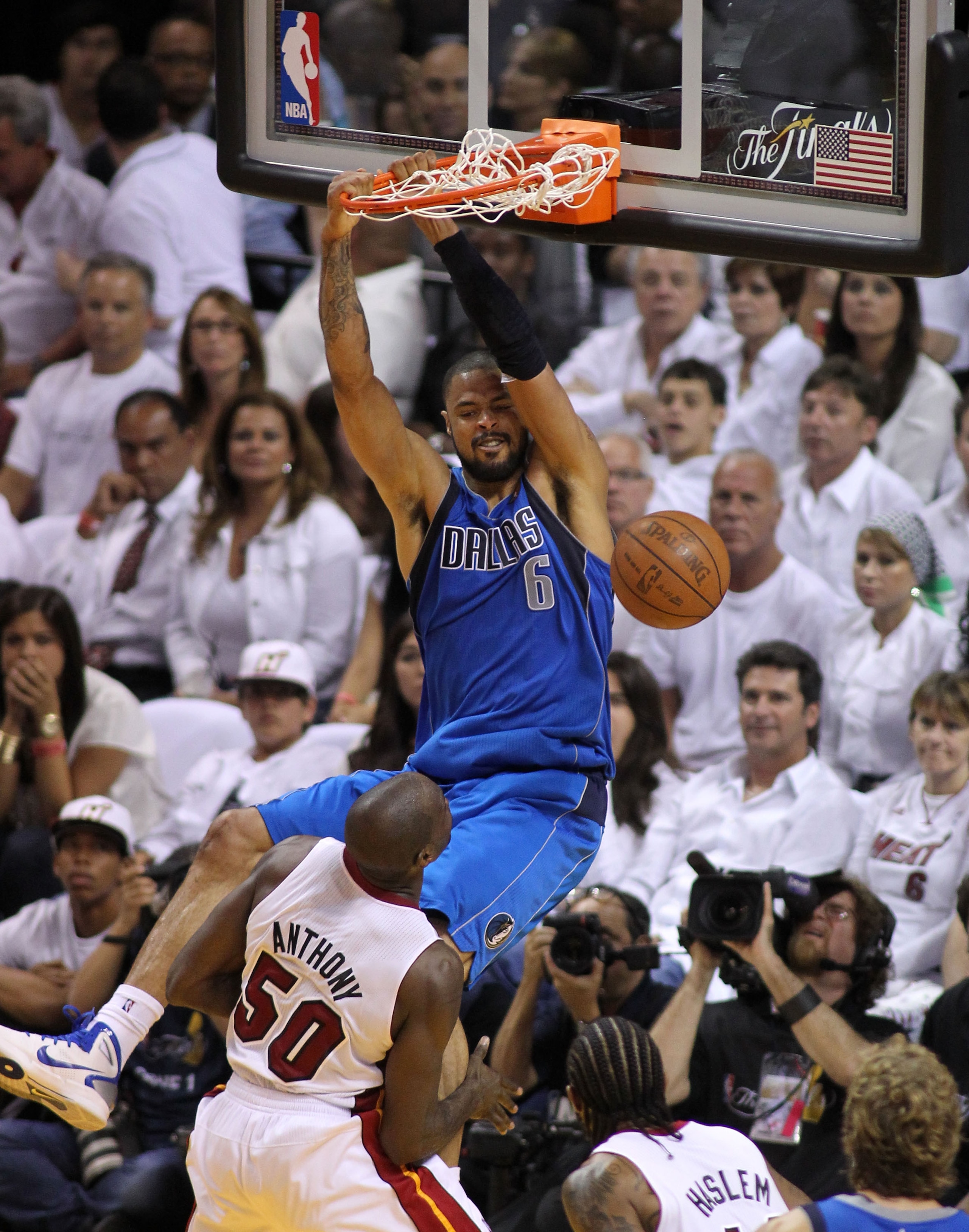 MIAMI, FL - MAY 31:  Tyson Chandler #6 of the Dallas Mavericks dunks the ball against Joel Anthony #50 of the Miami Heat in the first half in Game One of the 2011 NBA Finals at American Airlines Arena on May 31, 2011 in Miami, Florida. NOTE TO USER: User