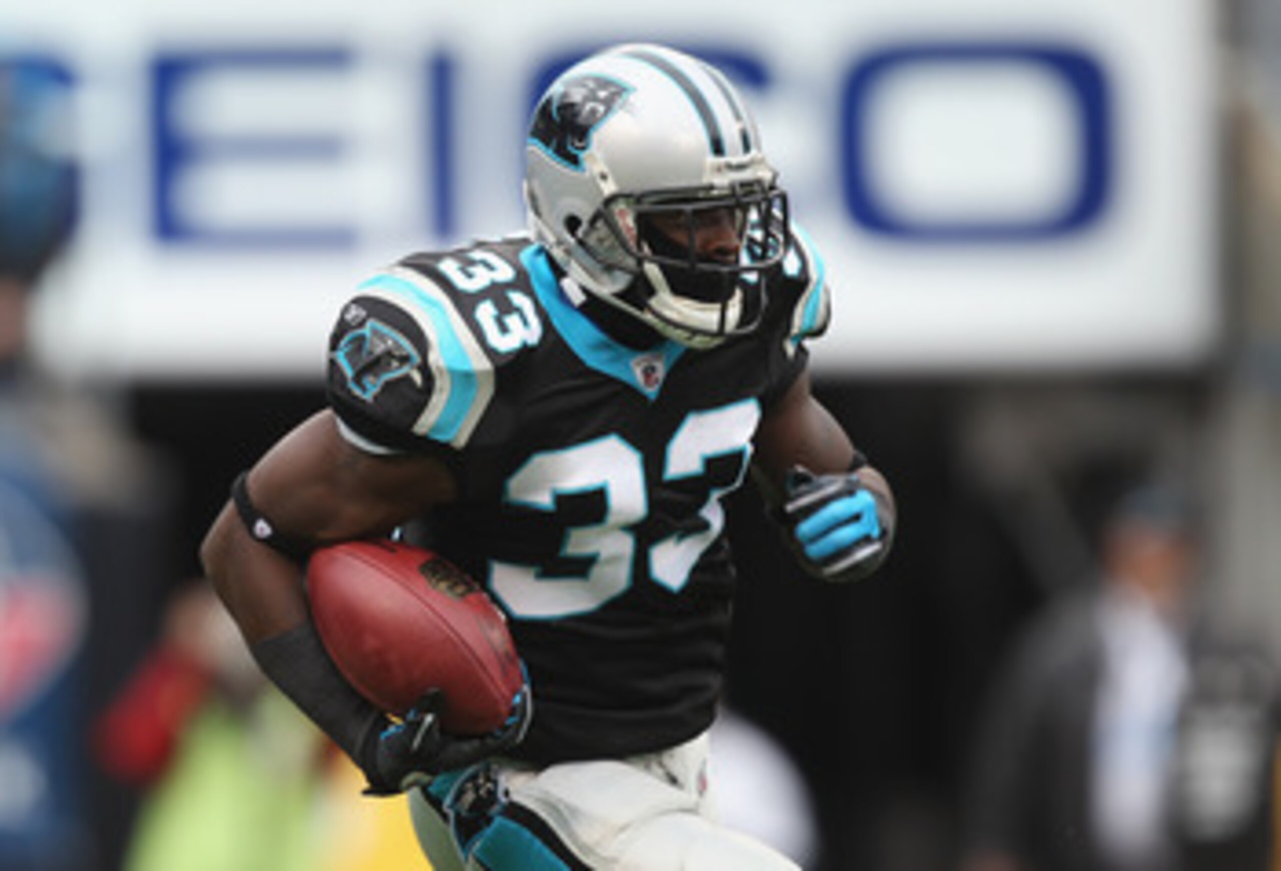 CHARLOTTE, NC - DECEMBER 12:  Mike Goodson #33 of the Carolina Panthers during their game against the Atlanta Falcons at Bank of America Stadium on December 12, 2010 in Charlotte, North Carolina.  (Photo by Streeter Lecka/Getty Images)