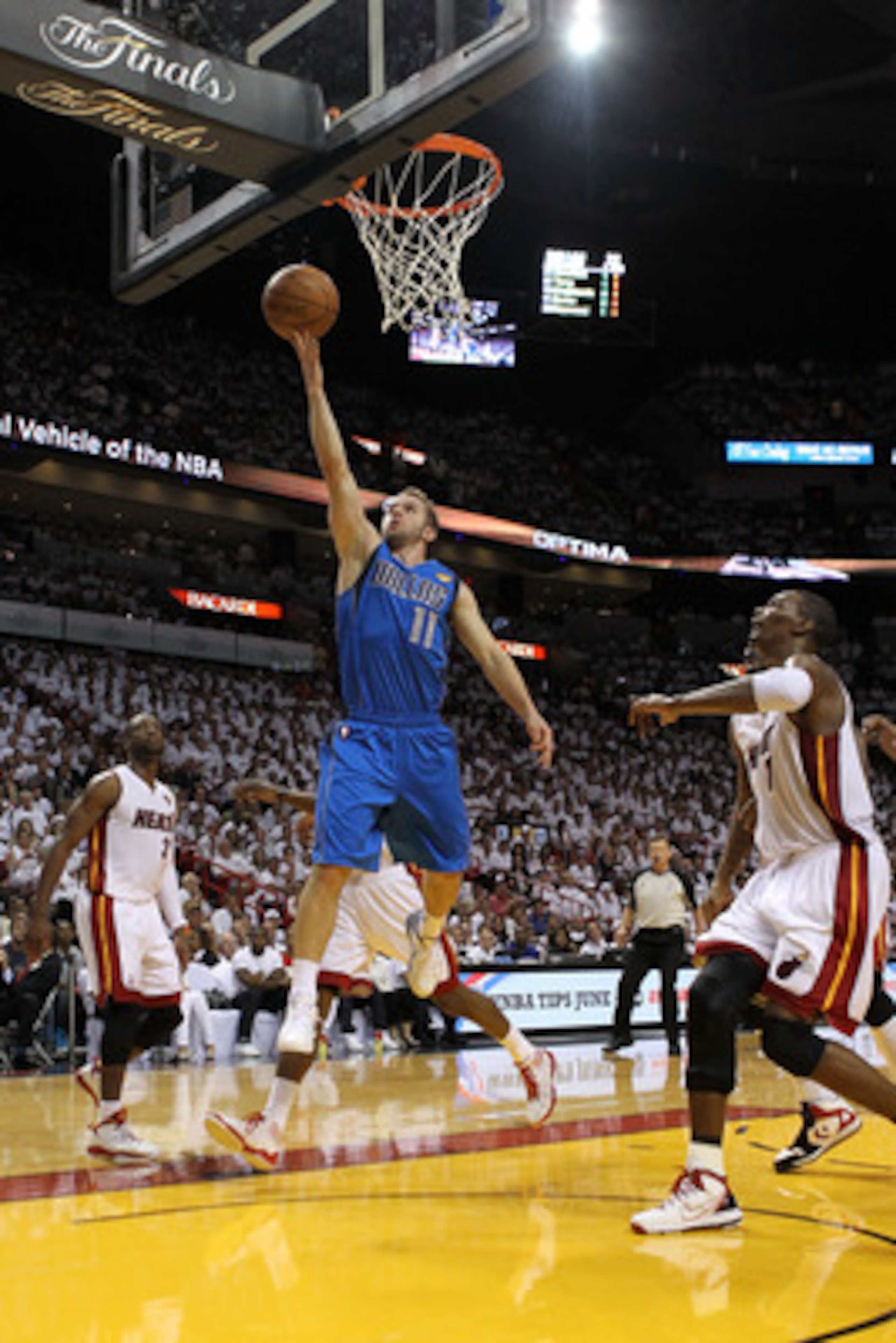 MIAMI, FL - MAY 31:  Jose Juan Barea #11 of the Dallas Mavericks lays the ball up against the Miami Heat in the first half in Game One of the 2011 NBA Finals at American Airlines Arena on May 31, 2011 in Miami, Florida. NOTE TO USER: User expressly acknow