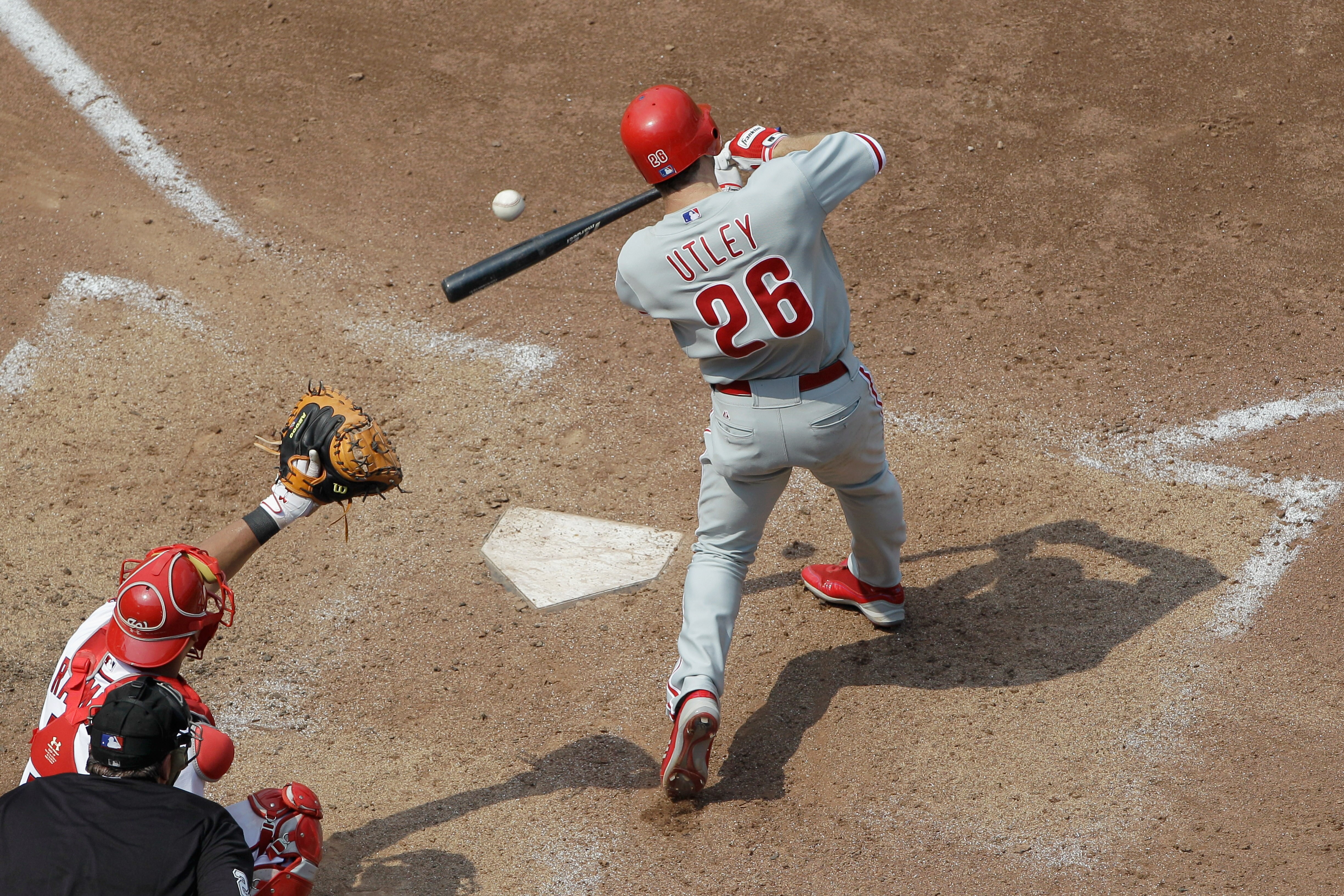 WASHINGTON, DC - JUNE 01: Chase Utley #26 of the Philadelphia Phillies fouls off a pitch to catcher Wilson Ramos #3 of the Washington Nationals during the seventh inning at Nationals Park on June 1, 2011 in Washington, DC.  (Photo by Rob Carr/Getty Images