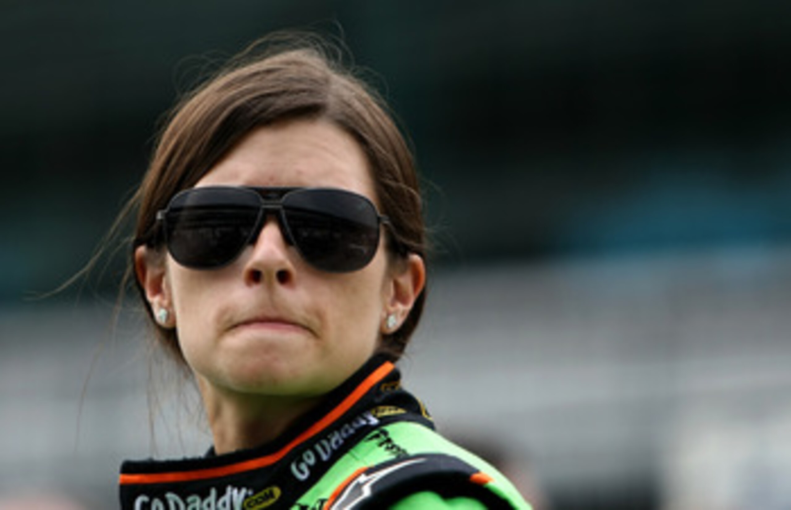 INDIANAPOLIS - MAY 22:  Danica Patrick waits to drive her #7 Team GoDaddy Andretti Autosport Dallara Honda during qualifying for the the 95th Indianapolis 500 Mile Race at the Indianapolis Motor Speedway on May 22, 2011 in Indianapolis, Indiana.  (Photo b