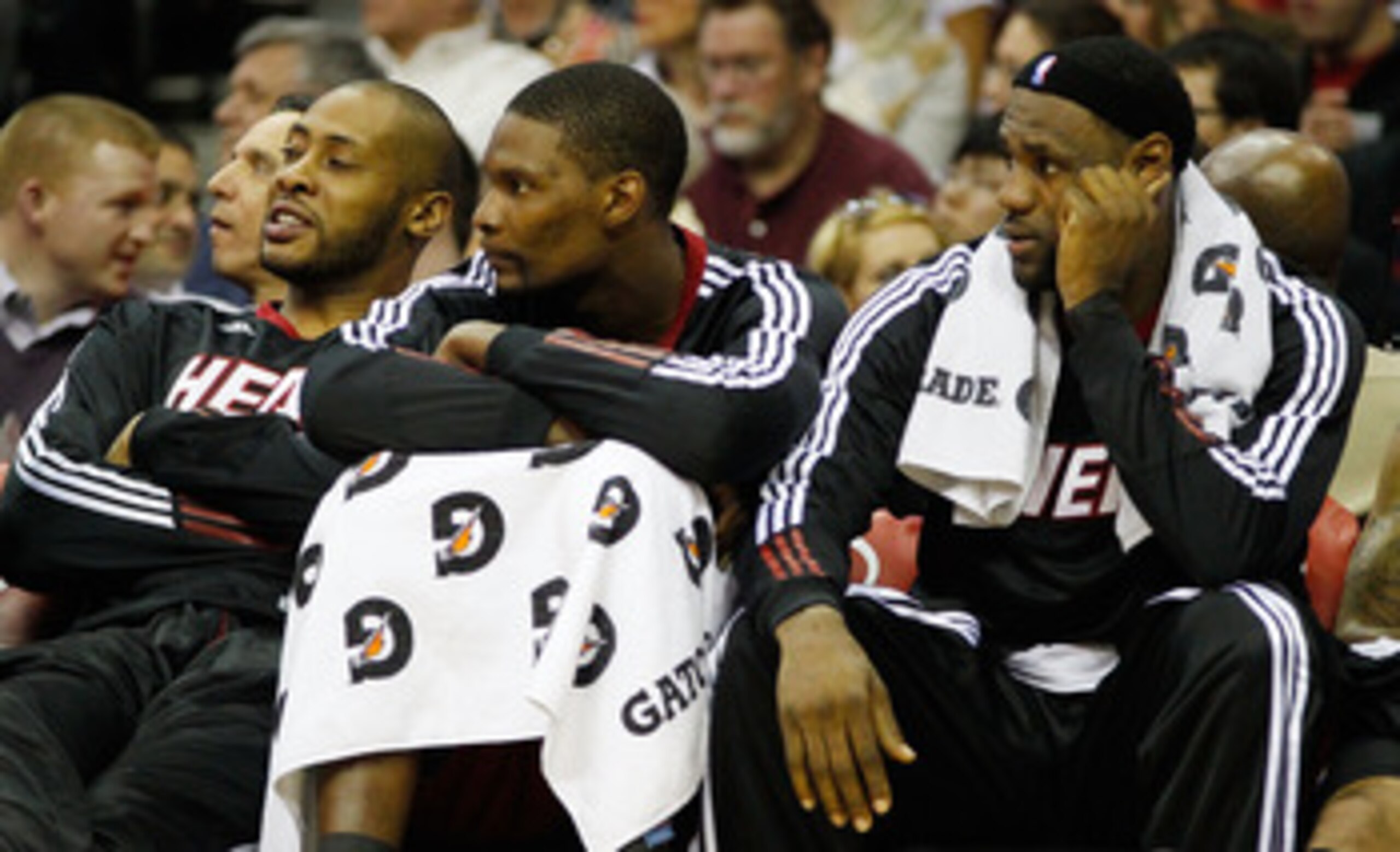 CLEVELAND - MARCH 29: LeBron James #6 and Chris Bosh #1 of the Miami Heat sit on the bench during the game against the Cleveland Cavaliers on March 29, 2011 at Quicken Loans Arena in Cleveland, Ohio. NOTE TO USER: User expressly acknowledges and agrees th