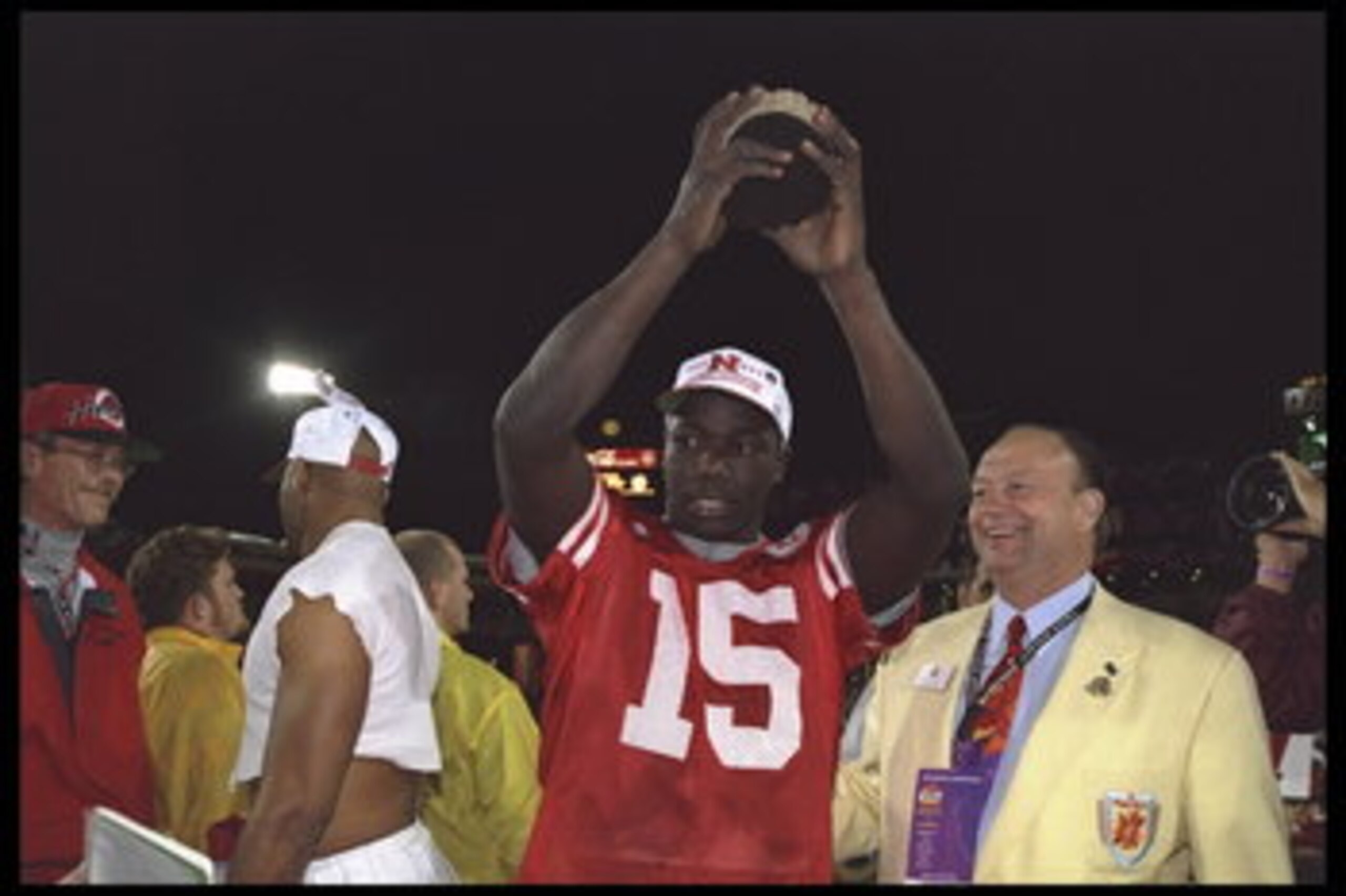2 Jan 1996:  Quarterback Tommie Frazier #15 of the Nebraska Cornhuskers holds the trophy aloft after his team defeated the Florida Gators in the Fiesta Bowl at Sun Devil Stadium in Tempe, Arizona 62-24.  Mandatory Credit:  Mike Powell/Allsport