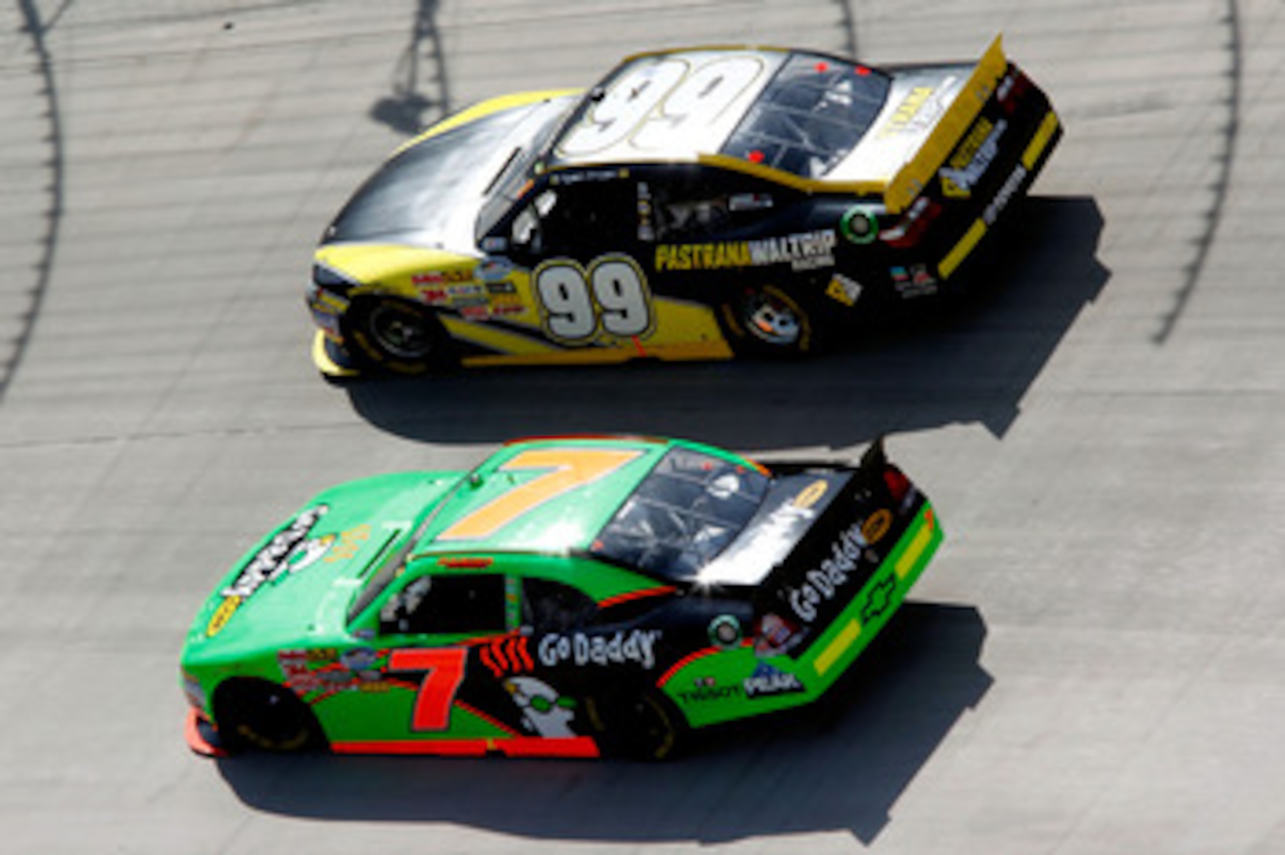 BRISTOL, TN - MARCH 19:  Danica Patrick, driver of the #7 GoDaddy.com Chevrolet, races Ryan Truex, driver of the #99 Pastrana Waltrip Racing Toyota, during the NASCAR Nationwide Series Scotts EZ Seed 300 at Bristol Motor Speedway on March 19, 2011 in Bris