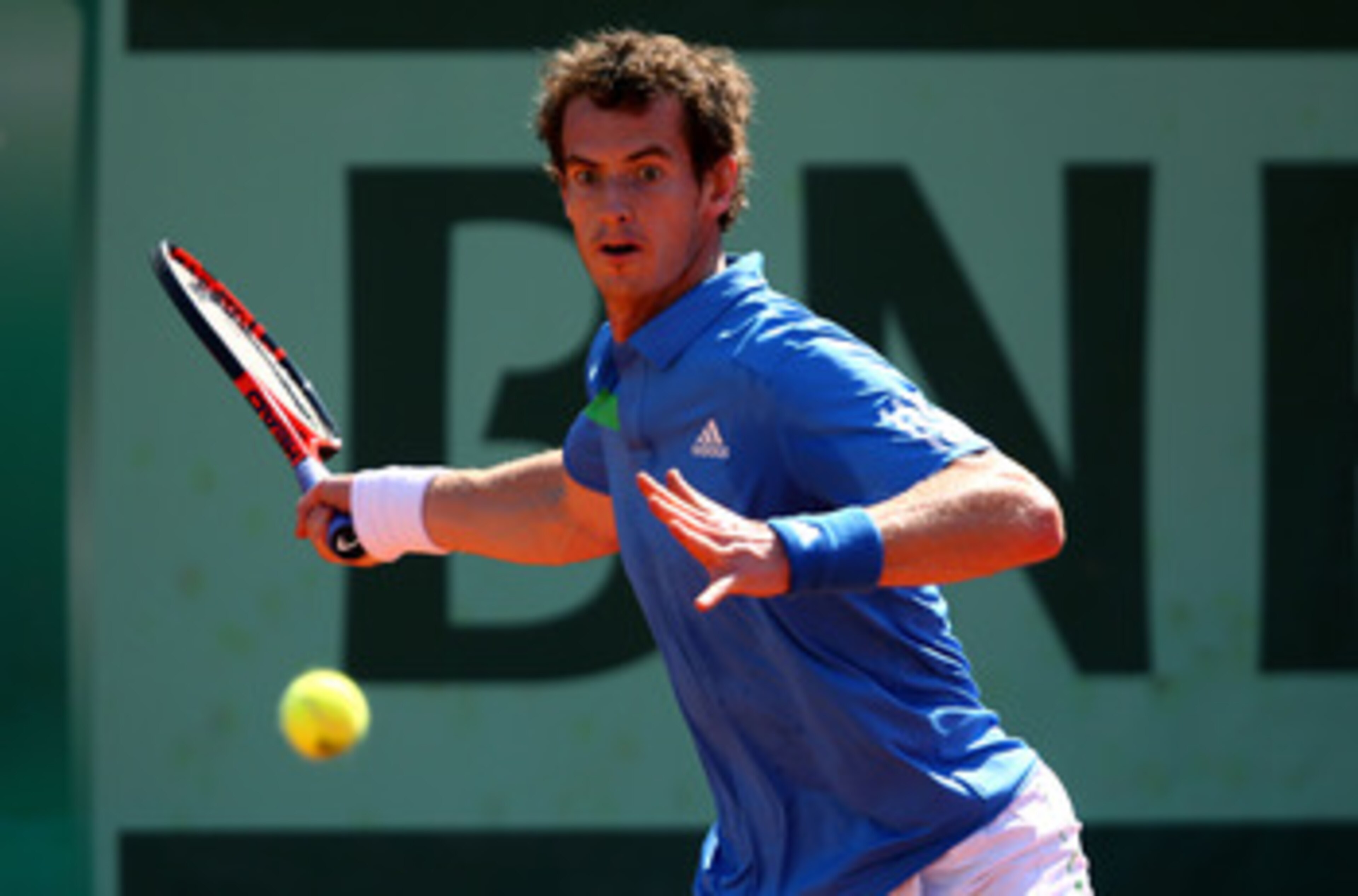PARIS, FRANCE - JUNE 01:  Andy Murray of Great Britain hits a forehand during the men's singles quarterfinal match between Andy Murray of Great Britain and Juan Ignacio Chela of Argentina on day eleven of the French Open at Roland Garros on June 1, 2011 i