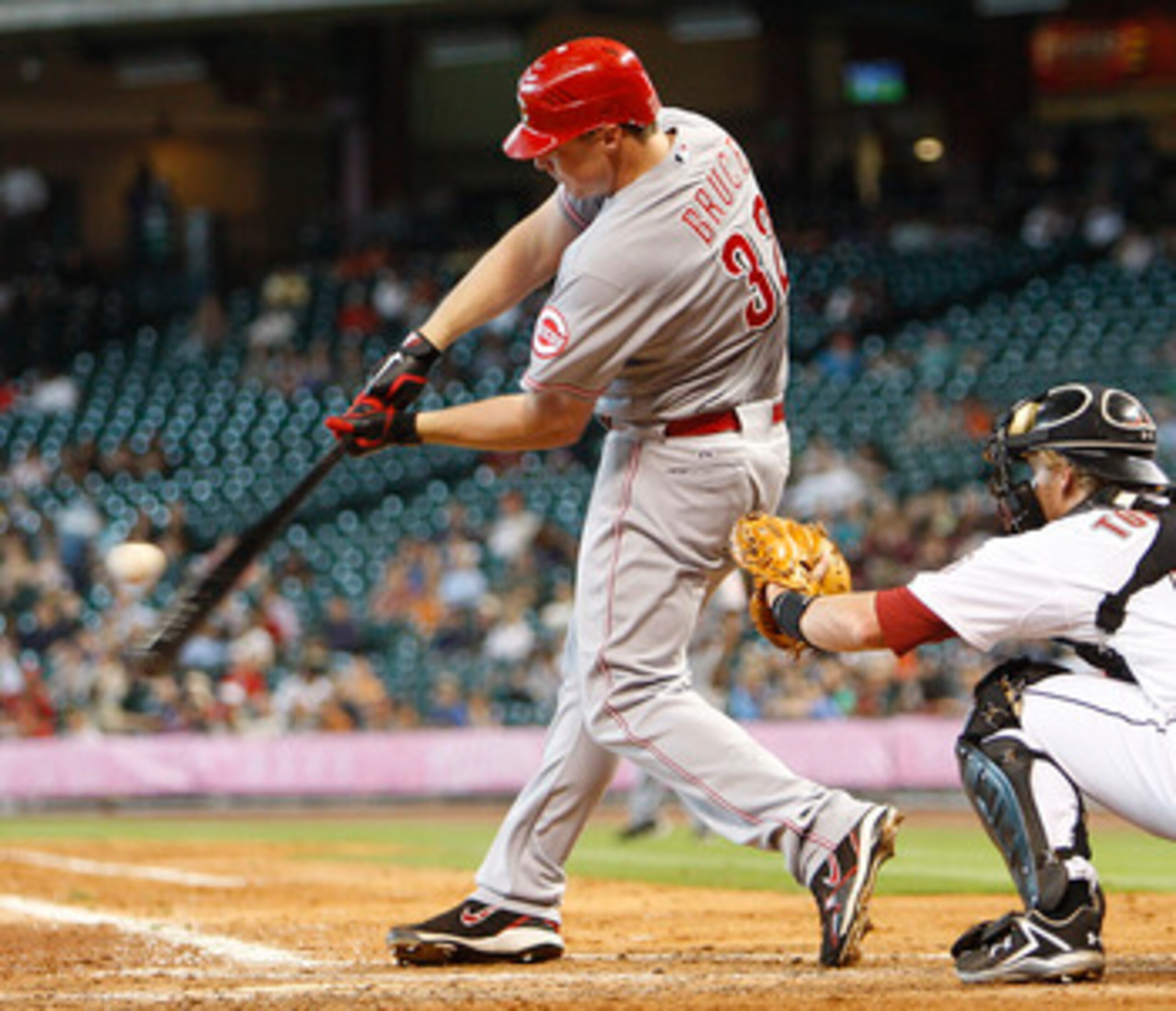 HOUSTON - MAY 11:  Jay Bruce #32 of the Cincinnati Reds grounds out to first base against the Houston Astros at Minute Maid Park on May 11, 2011 in Houston, Texas.  (Photo by Bob Levey/Getty Images)
