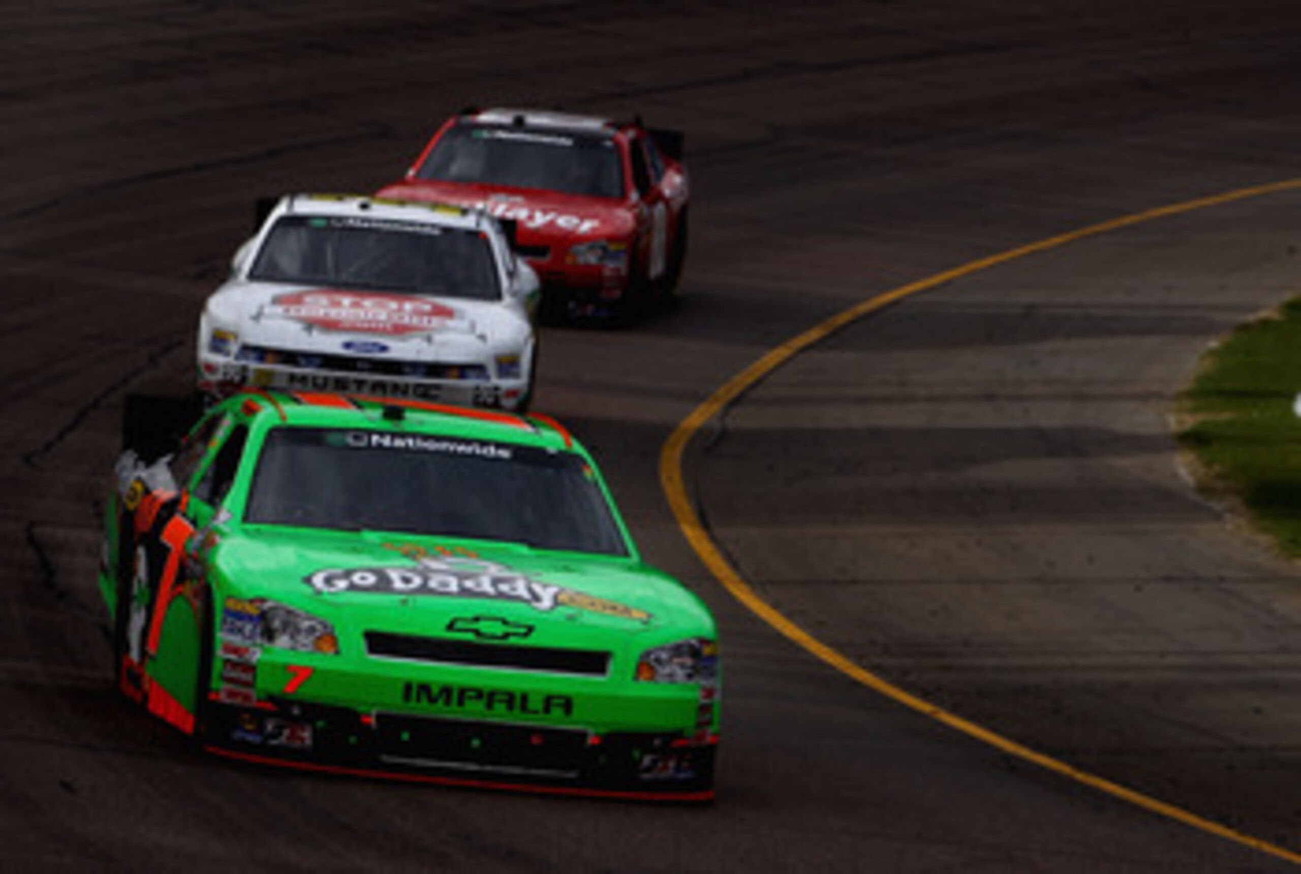 AVONDALE, AZ - FEBRUARY 26:  Danica Patrick, driver of the #7 GoDaddy.com Chevrolet, races during the NASCAR Nationwide Series Bashas' Supermarkets 200 at Phoenix International Raceway on February 26, 2011 in Avondale, Arizona.  (Photo by Christian Peters