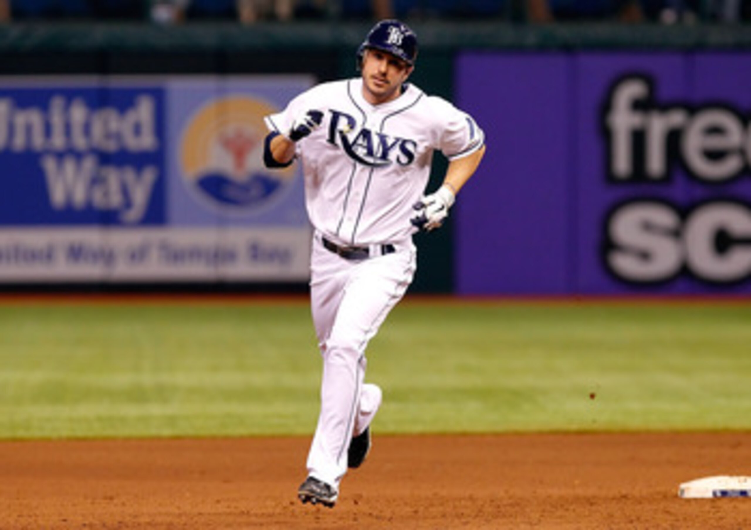 ST. PETERSBURG, FL - MAY 31:  Outfielder Matt Joyce #20 of the Tampa Bay Rays rounds the bases after his home run against the Texas Rangers during the game at Tropicana Field on May 31, 2011 in St. Petersburg, Florida.  (Photo by J. Meric/Getty Images)