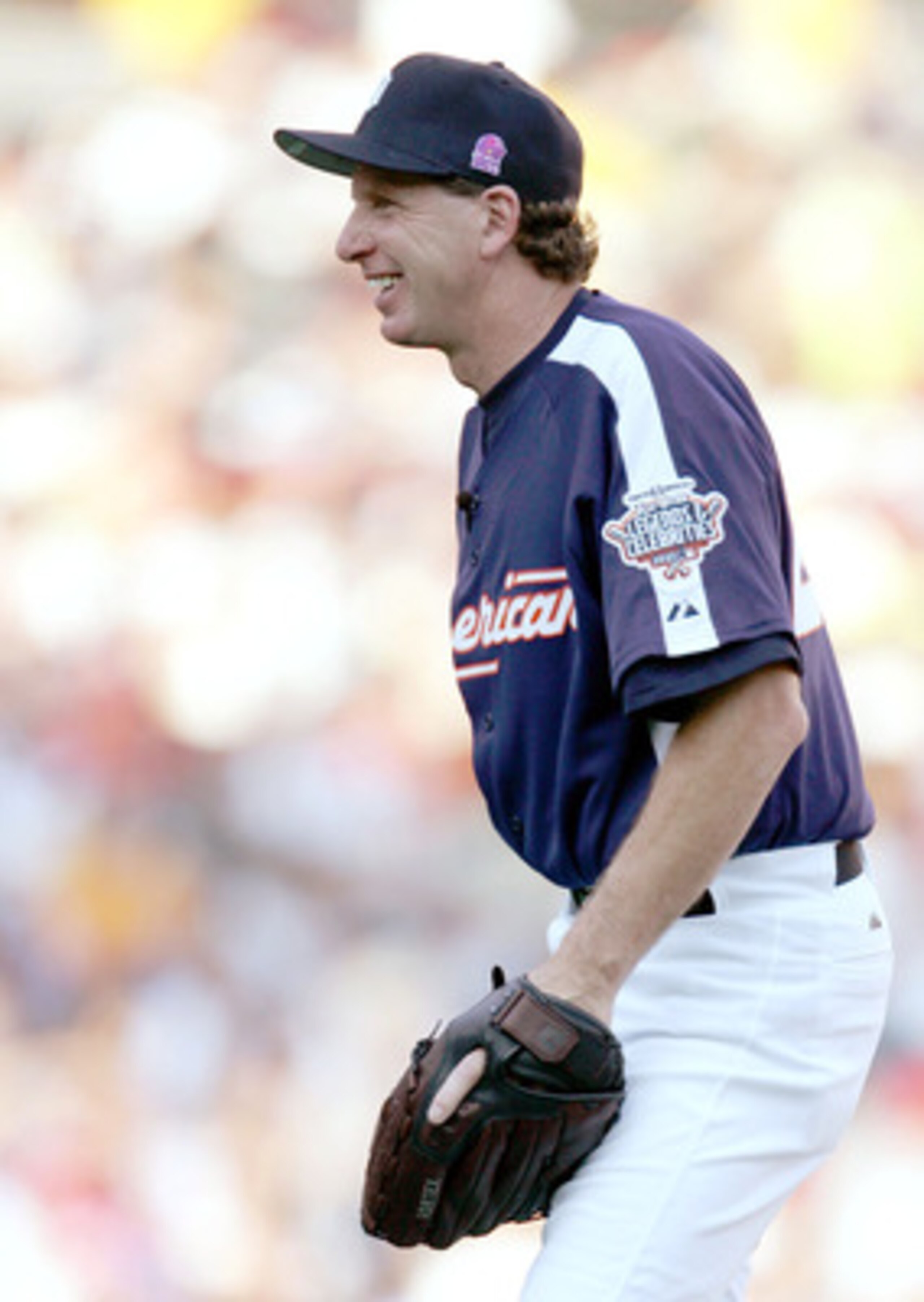 DETROIT - JULY 10:  Former MLB pitcher Mark Fidrych of the Legends Team smiles on the mound during the 2005 Major League Baseball Legends/Celebrity Game at Comerica Park on July 10, 2005 in Detroit, Michigan.  (Photo by Jonathan Daniel/Getty Images)