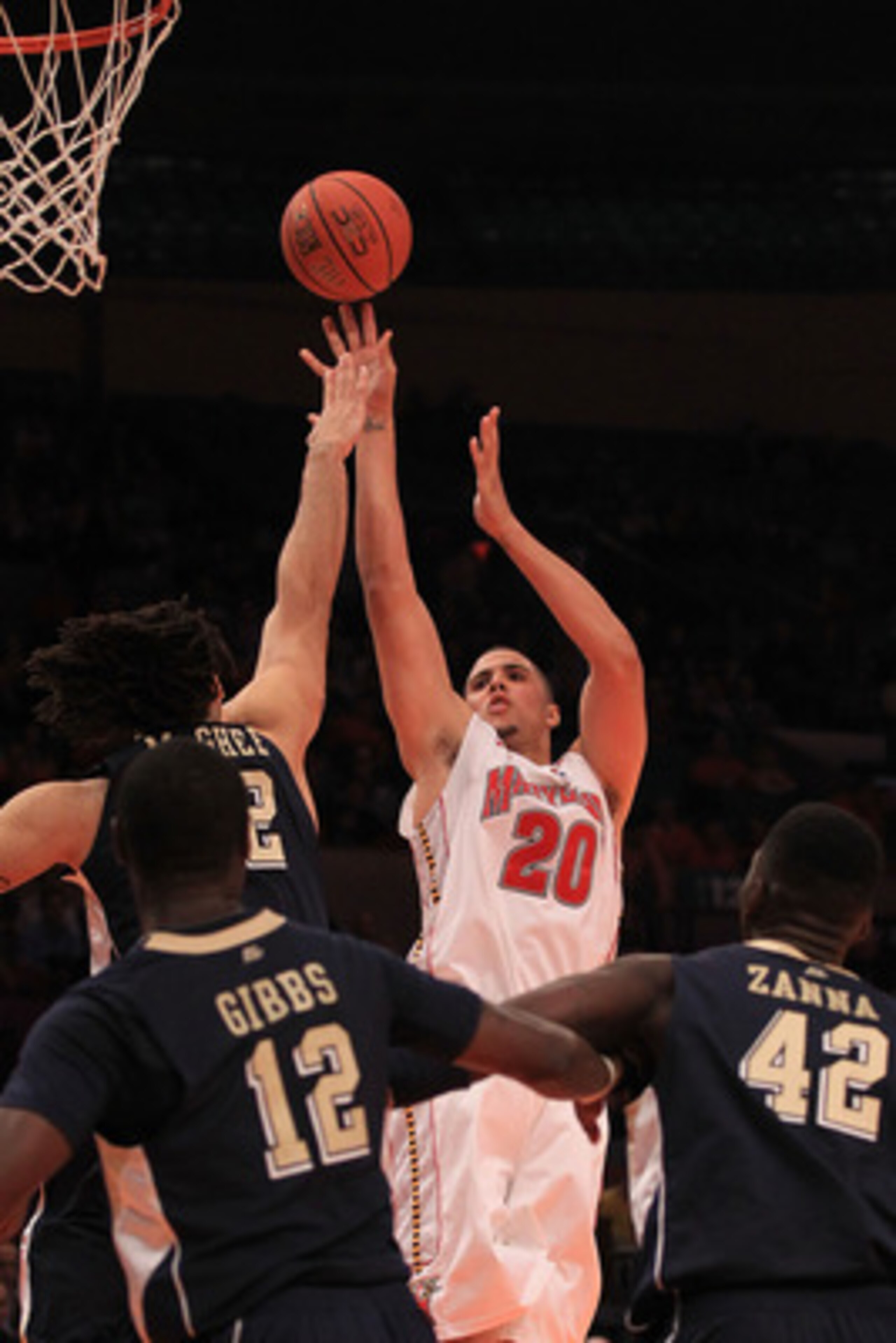 NEW YORK - NOVEMBER 18:  Jordan Williams #20 of the Maryland Terrapins shoots over Gary McGhee #52 of the Pittsburgh Panthers during the 2k Sports Classic at Madison Square Garden on November 18, 2010 in New York, New York.  (Photo by Chris McGrath/Getty 