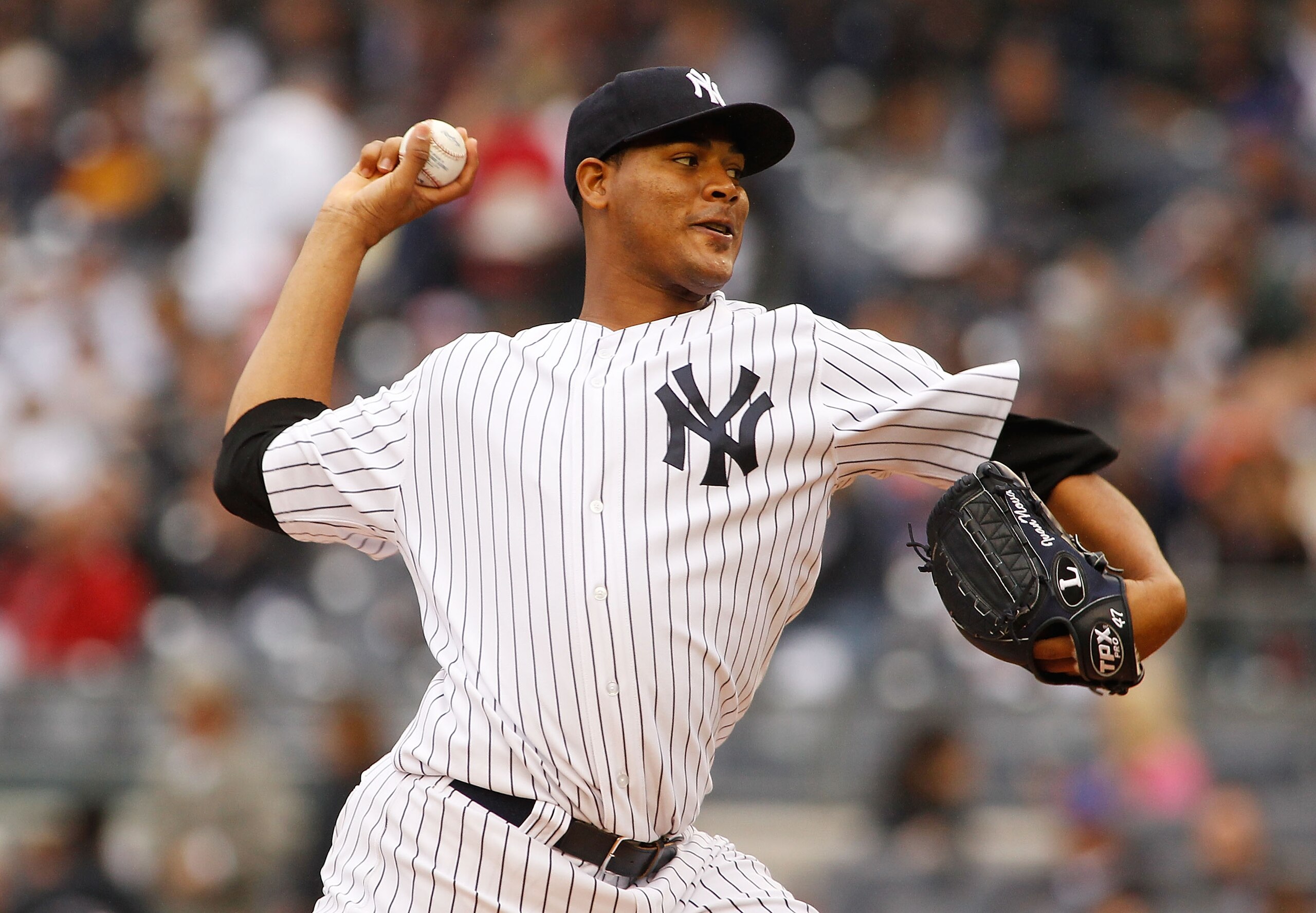 NEW YORK - MAY 22:  Ivan Nova #47 of the New York Yankees delivers a pitch in the first inning against the New York Mets on May 22, 2011 at Yankee Stadium in the Bronx borough of New York City.  (Photo by Mike Stobe/Getty Images)