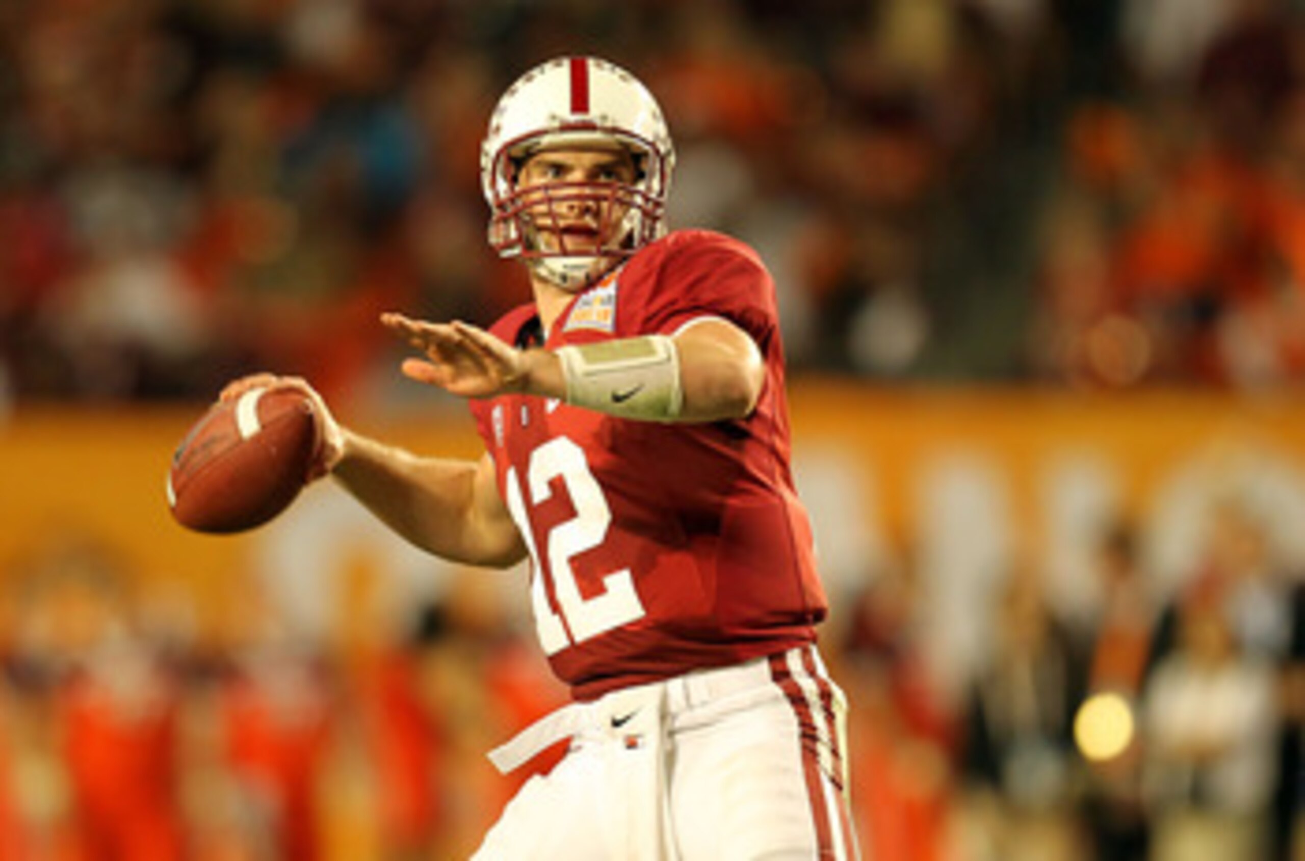 MIAMI, FL - JANUARY 03: Andrew Luck #12 of the Stanford Cardinal throws a pass against the Virginia Tech Hokies during the 2011 Discover Orange Bowl at Sun Life Stadium on January 3, 2011 in Miami, Florida. (Photo by Mike Ehrmann/Getty Images)