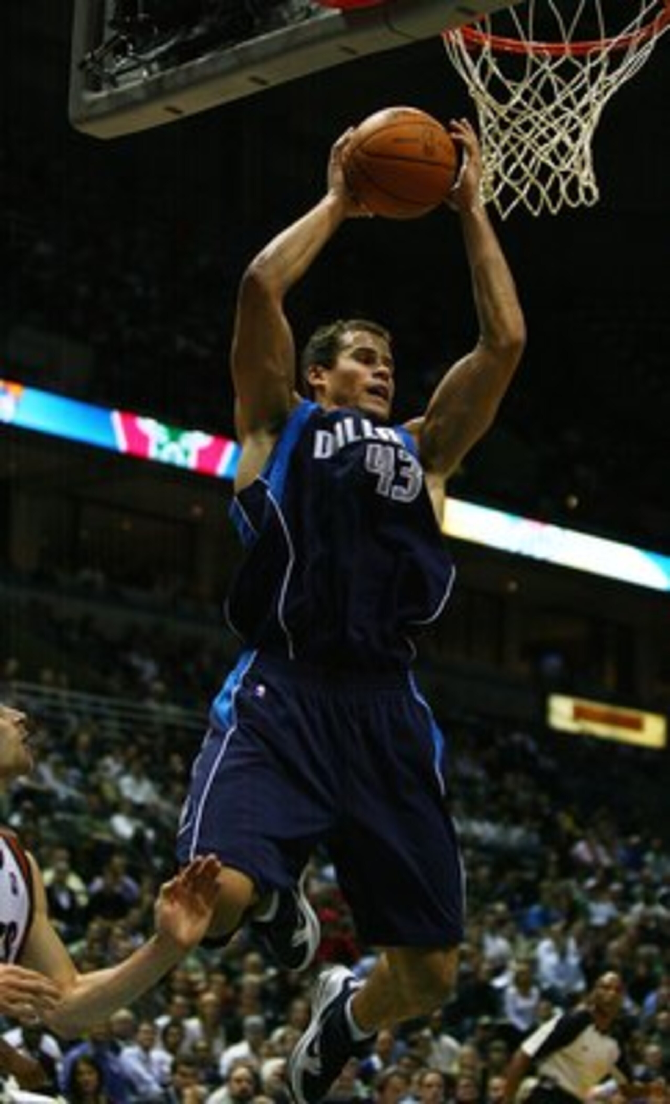 MILWAUKEE - NOVEMBER 16: Kris Humphries #43 of the Dallas Mavericks grabs a rebound against the Milwaukee Bucks defends at the Bradley Center on November 16, 2009 in Milwaukee, Wisconsin. The Mavericks defeated the Bucks 115-113 in overtime.  (Photo by Jo