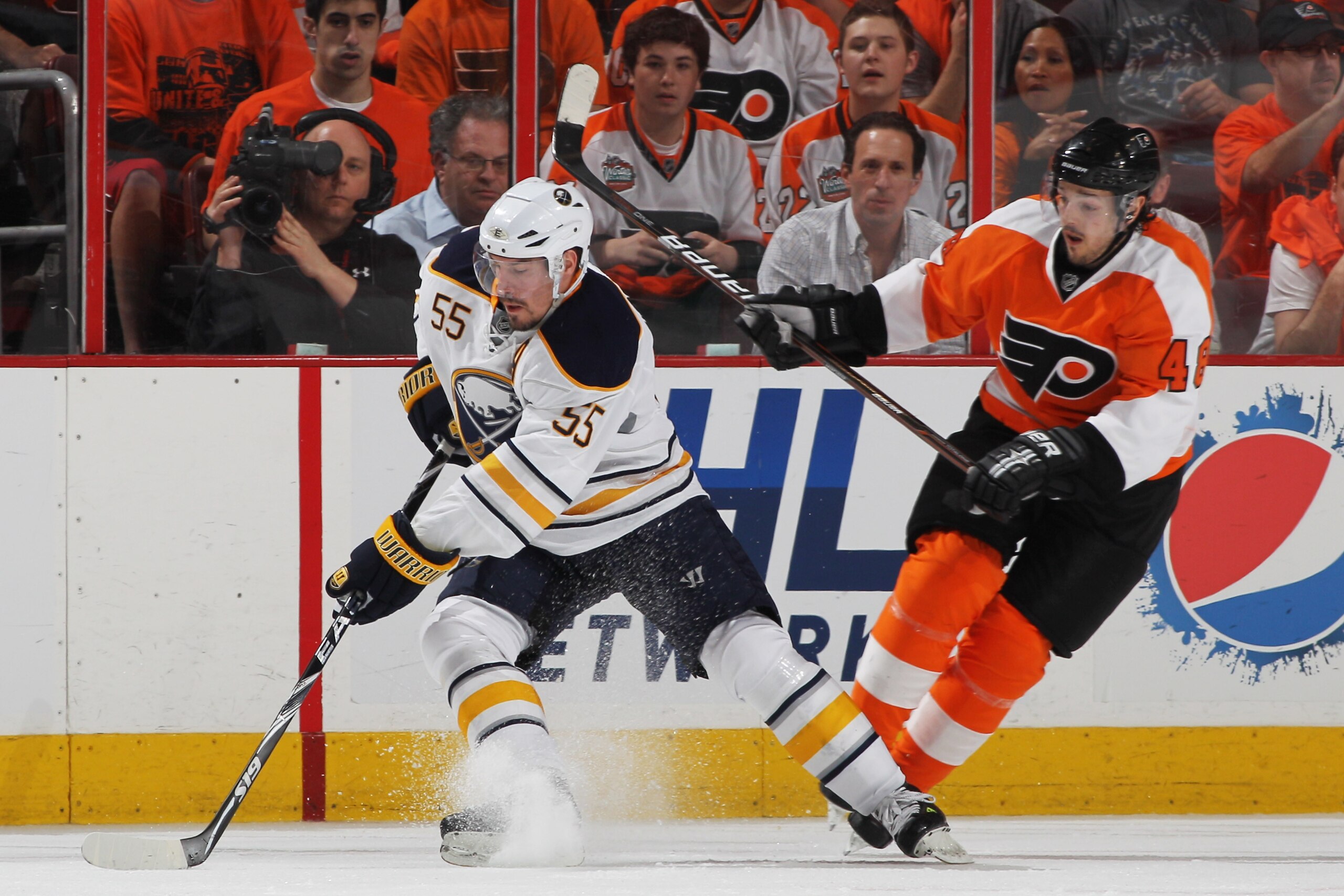 PHILADELPHIA, PA - APRIL 26: Jochen Hecht #55 of the Buffalo Sabres controls the puck infront of Danny Briere #48 of the Philadelphia Flyers in the second period of Game Seven of the Eastern Conference Quarterfinals during the 2011 NHL Stanley Cup Playof PHILADELPHIA, PA - APRIL 26: Jochen Hecht #55 of the Buffalo Sabres controls the puck infront of Danny Briere #48 of the Philadelphia Flyers in the second period of Game Seven of the Eastern Conference Quarterfinals during the 2011 NHL Stanley Cup Playof
