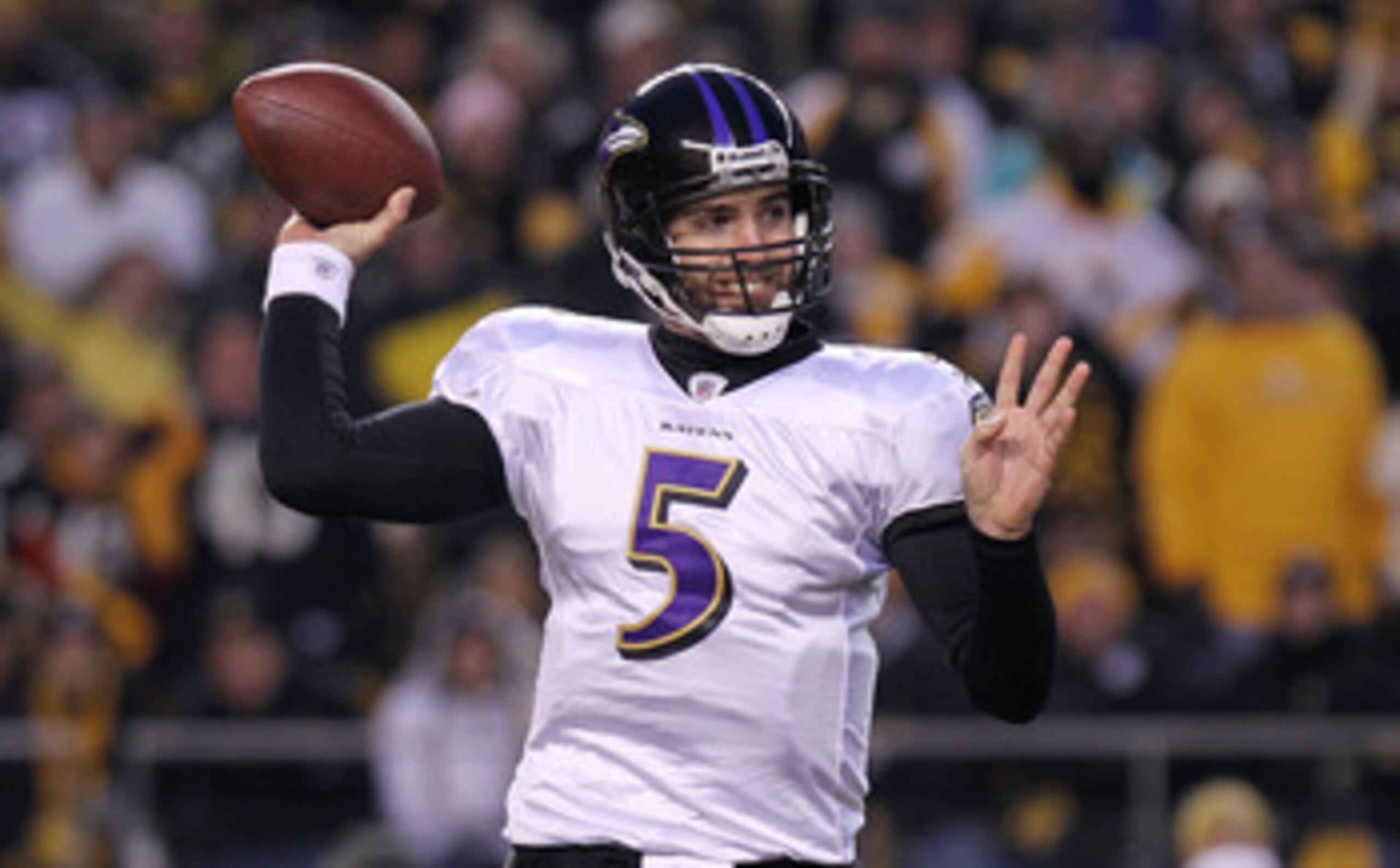 PITTSBURGH, PA - JANUARY 15:  Quarterback Joe Flacco #5 of the Baltimore Ravens looks to pass against the Pittsburgh Steelers in the AFC Divisional Playoff Game at Heinz Field on January 15, 2011 in Pittsburgh, Pennsylvania.  (Photo by Nick Laham/Getty Im